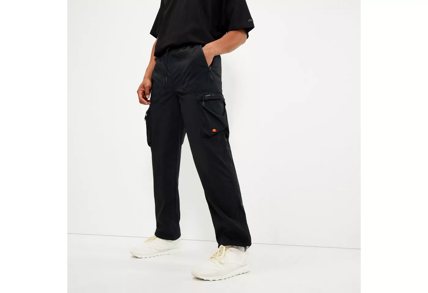 Ellesse Cargohose SQUADRON CARGO PANT mit Cargotaschen, wasserabweisendes Material, weite Beinform