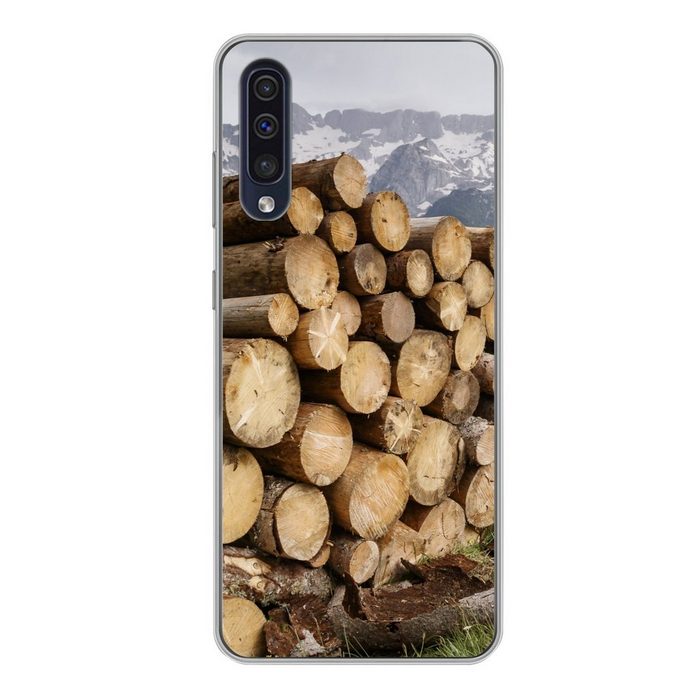 MuchoWow Handyhülle Mehrere Baumstämme sind in einer verschneiten Berglandschaft Handyhülle Samsung Galaxy A50 Smartphone-Bumper Print Handy