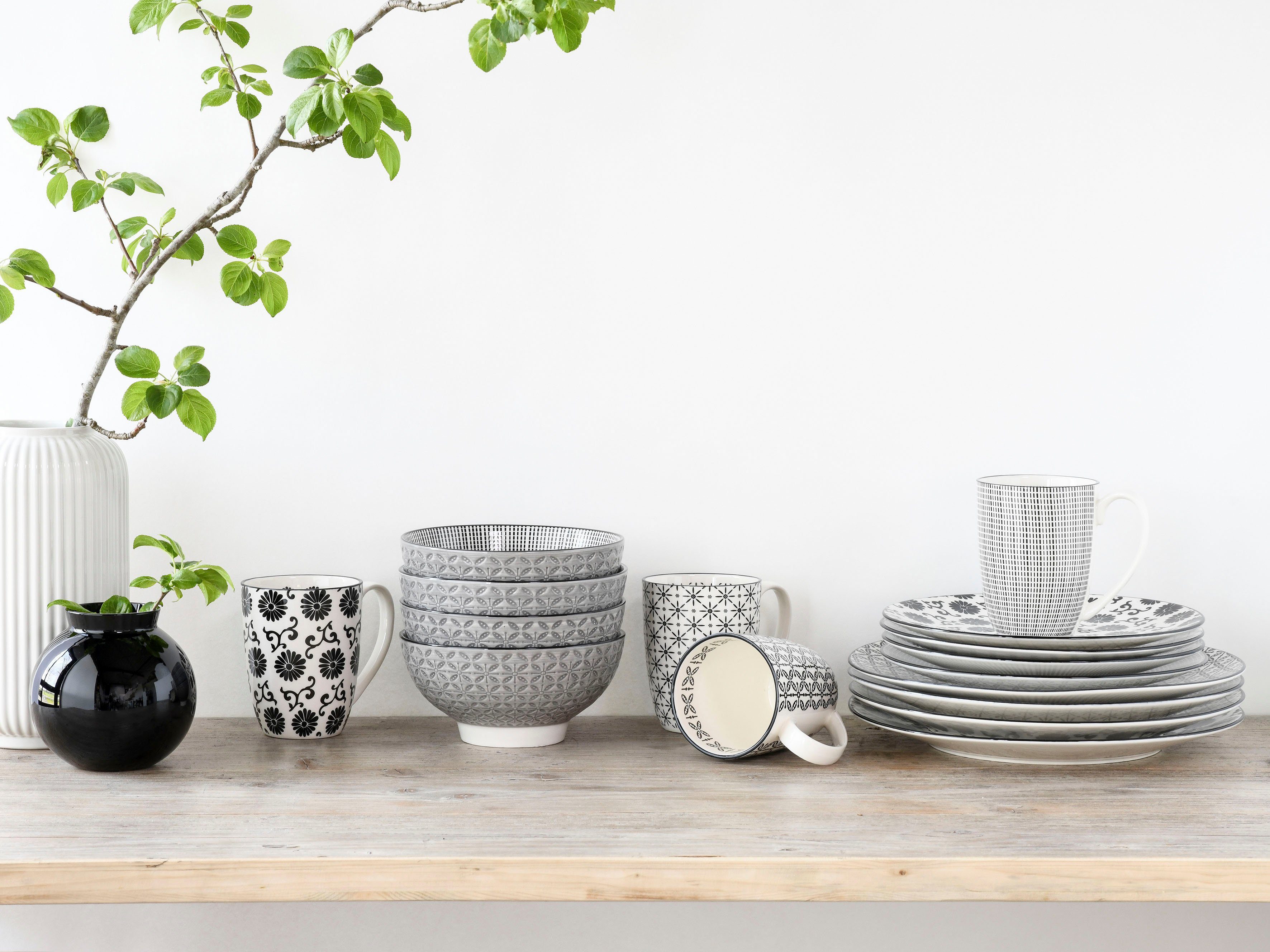 CreaTable Kombiservice New Style Black (16-tlg), 4 Personen, Steingut, 4 Designs im trendigen Schwarz/weiß Look