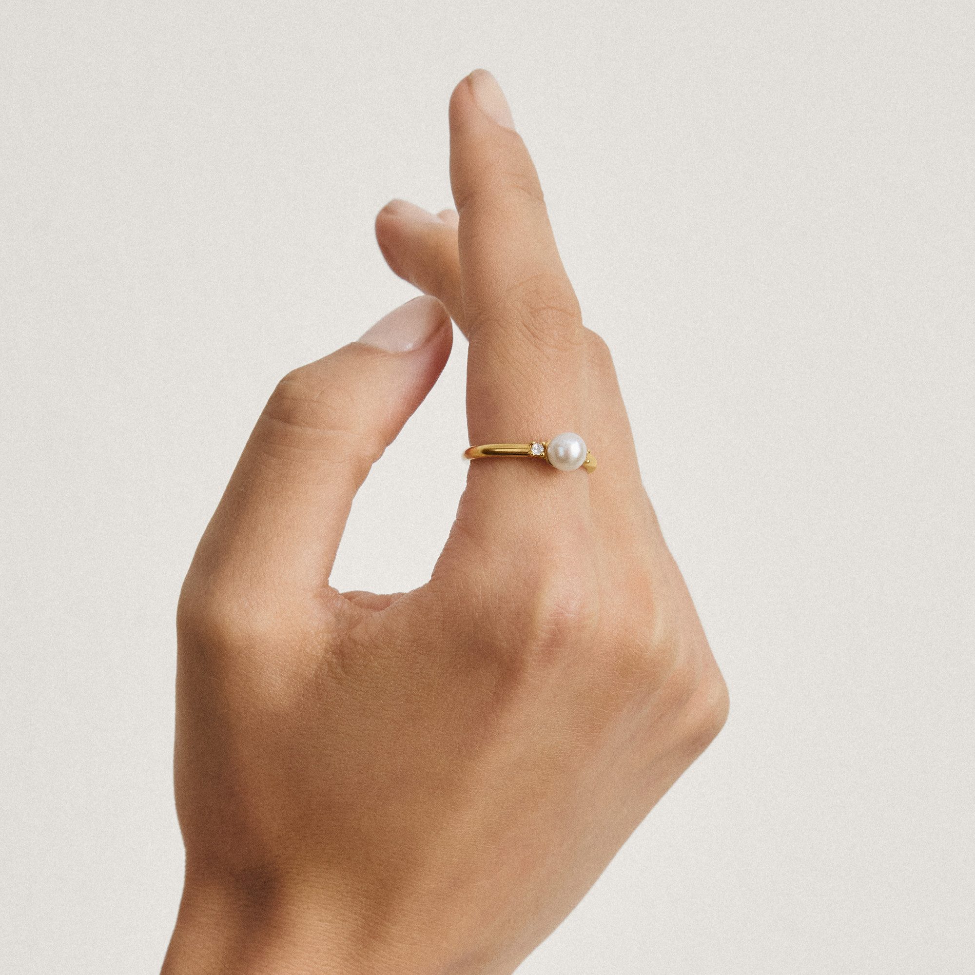 THOMAS SABO Fingerring Ring mit Perle gelbgoldfarben, mit Zirkonia (synth) - mit Süßwasserzuchtperle
