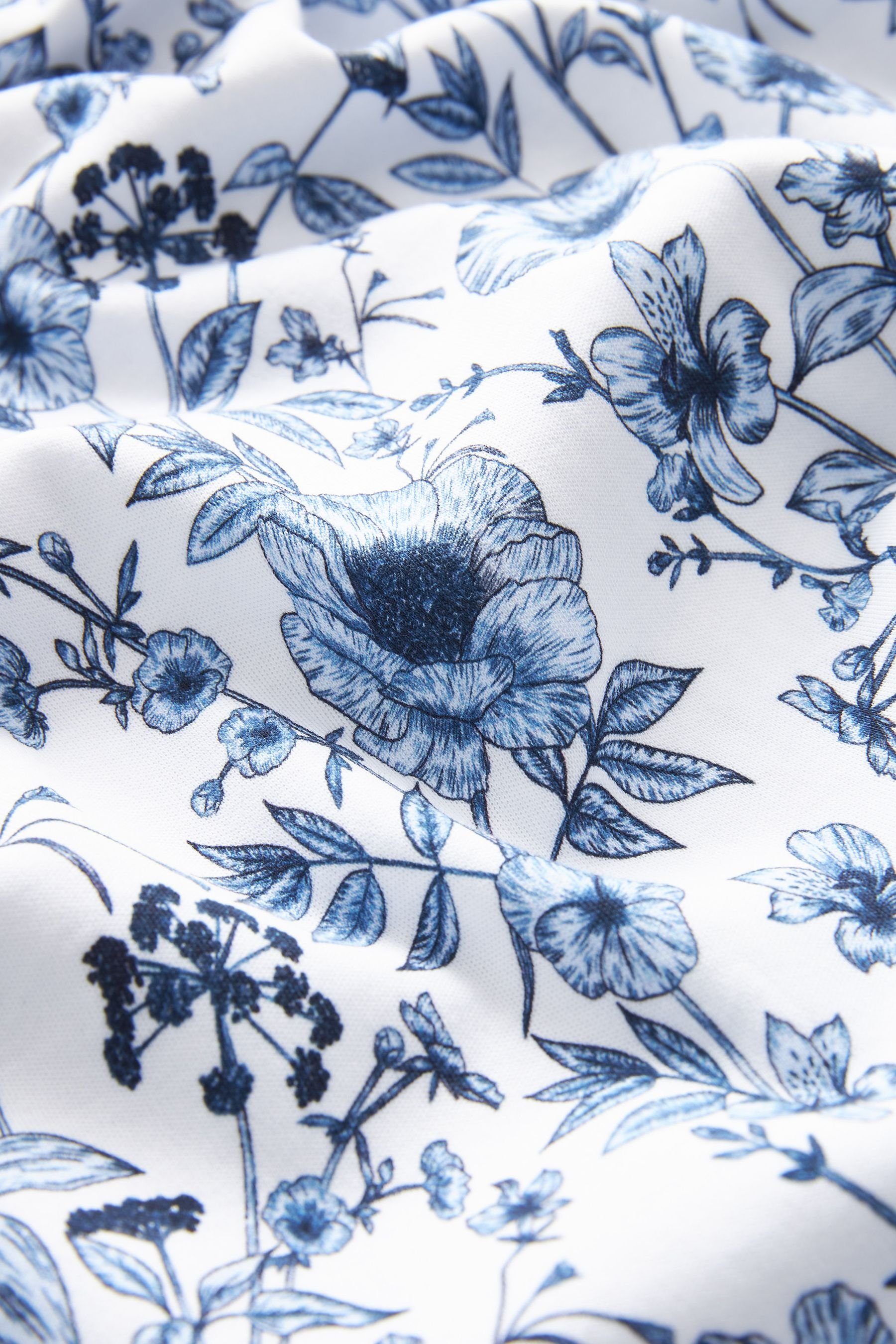 mit Polo-Shirt Next White/Blue (1-tlg) Poloshirt Floral Geoprint