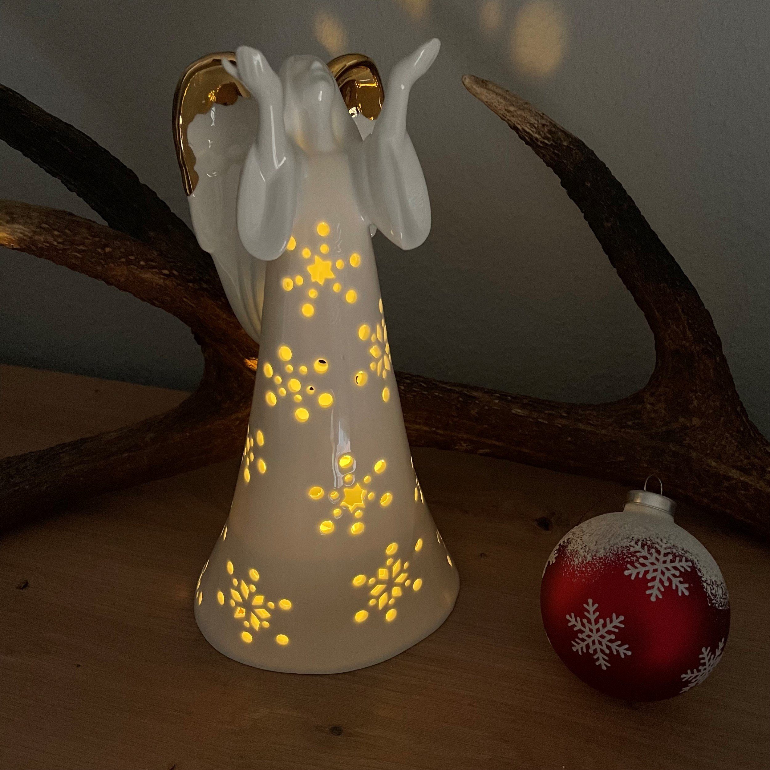 Beleuchtung Online-Fuchs cm, aus glänzend, Weihnachtsdeko fest an Keramik Engel & 272, Maße: mit LED 26x13x12 Schneeflocken Flügeln, Dekoobjekt Gold den warmweiß, Timer LED integriert, als LED