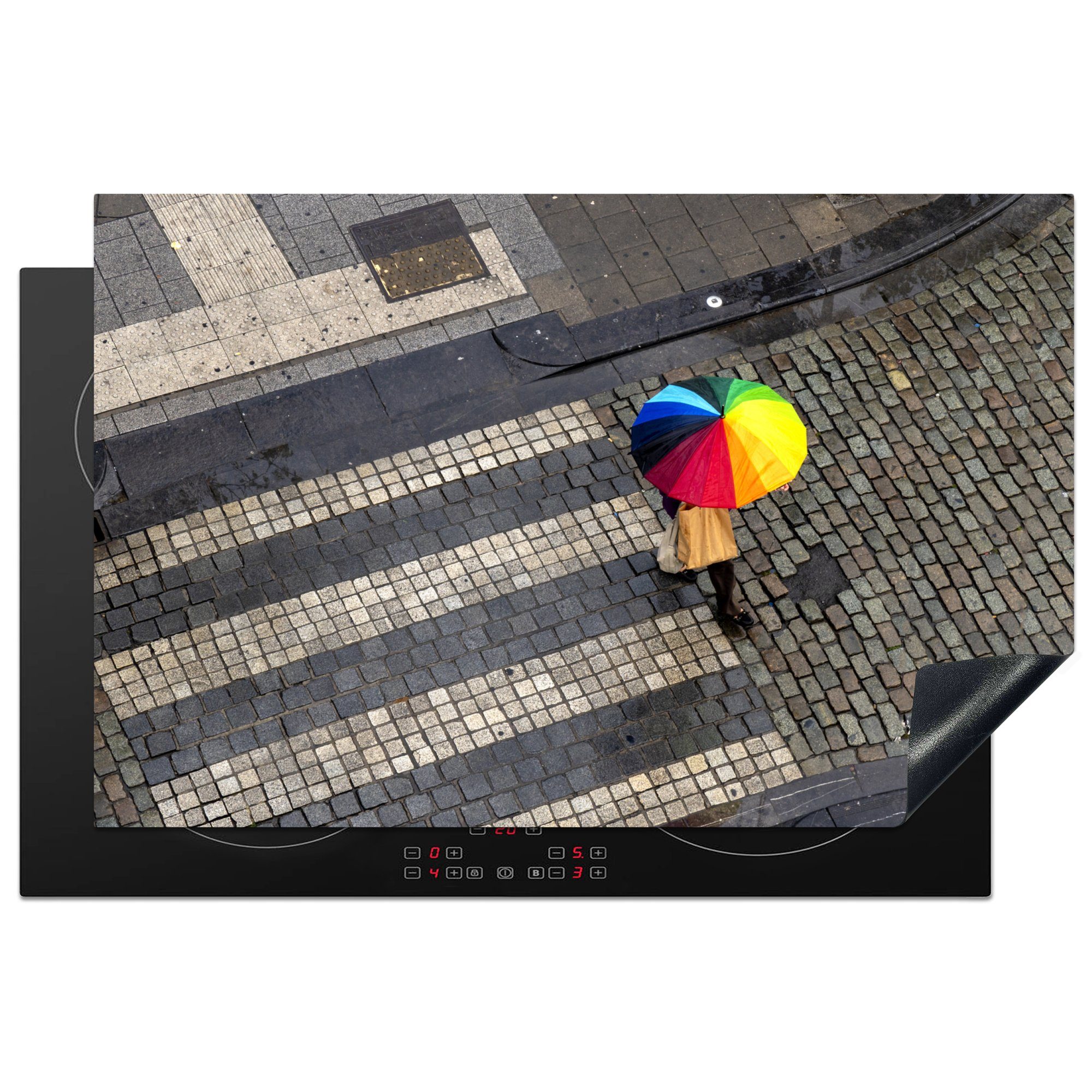 MuchoWow Herdblende-/Abdeckplatte Farbenprächtiger Regenschirm auf einer gepflasterten Straße, Vinyl, (1 tlg), 81x52 cm, Induktionskochfeld Schutz für die küche, Ceranfeldabdeckung