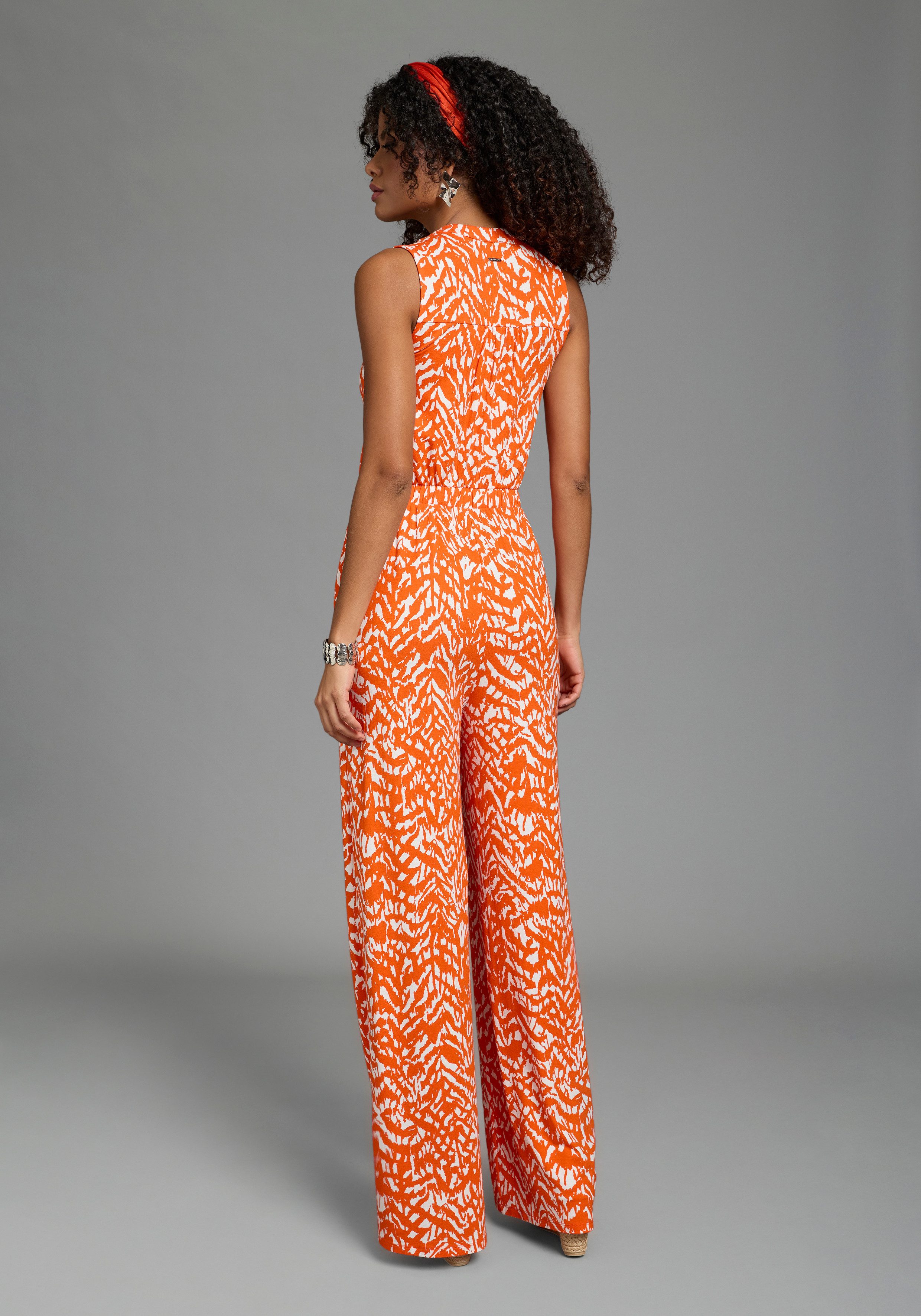 Laura Scott Jumpsuit mit sommerlichem Muster, modisch weites Bein und Knopf günstig online kaufen