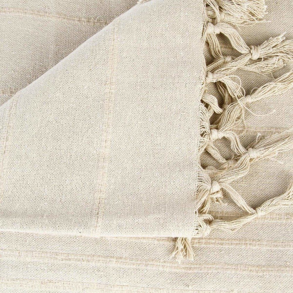 Atmosphera Créateur d'intérieur Tagesdecke Baumwoll-Tagesdecke in beige mit Fransen 230x250 cm auf dem Sofa