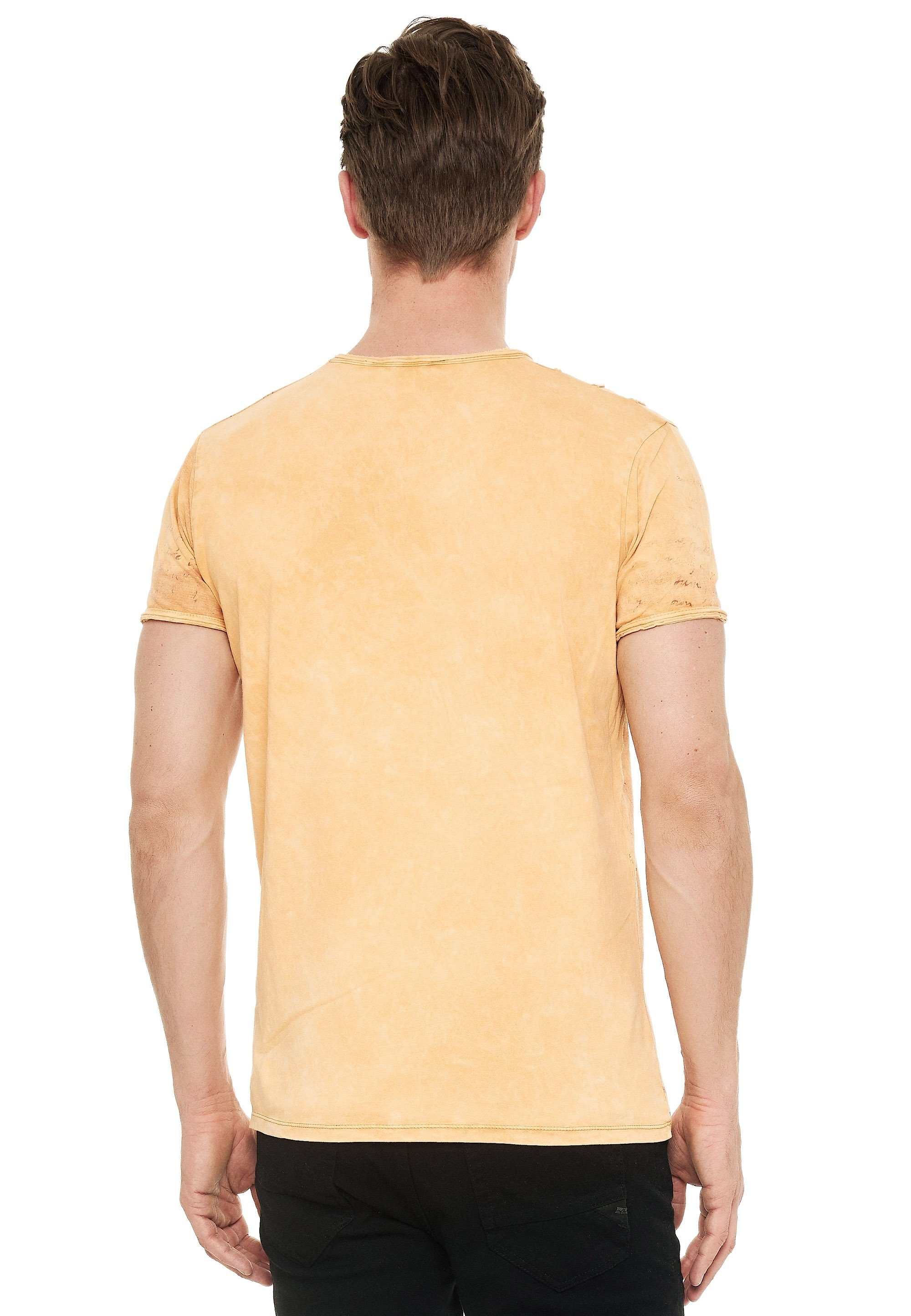 Rusty Neal T-Shirt mit eindrucksvollem Print