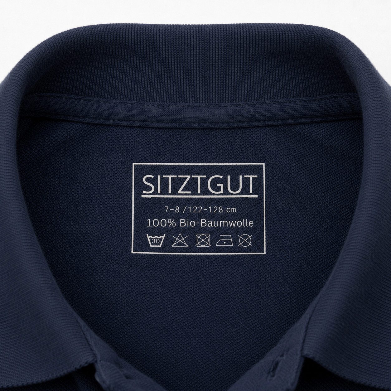 Sitztgut Poloshirt Kinder Polo-Shirt aus Bio-Baumwolle (1-tlg) Seitenschlitze, verlängertes Rückenteil und Transfer-Necklabel