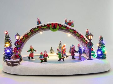 Spetebo Weihnachtsszene LED Eisbahn mit Figuren - beleuchtet - Brücke, mit Musik