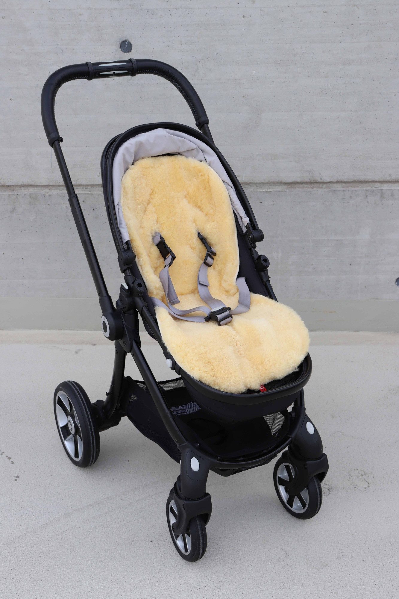 Kaiser Kinderwagen-Sitzauflage Lammfellauflage Patchwork