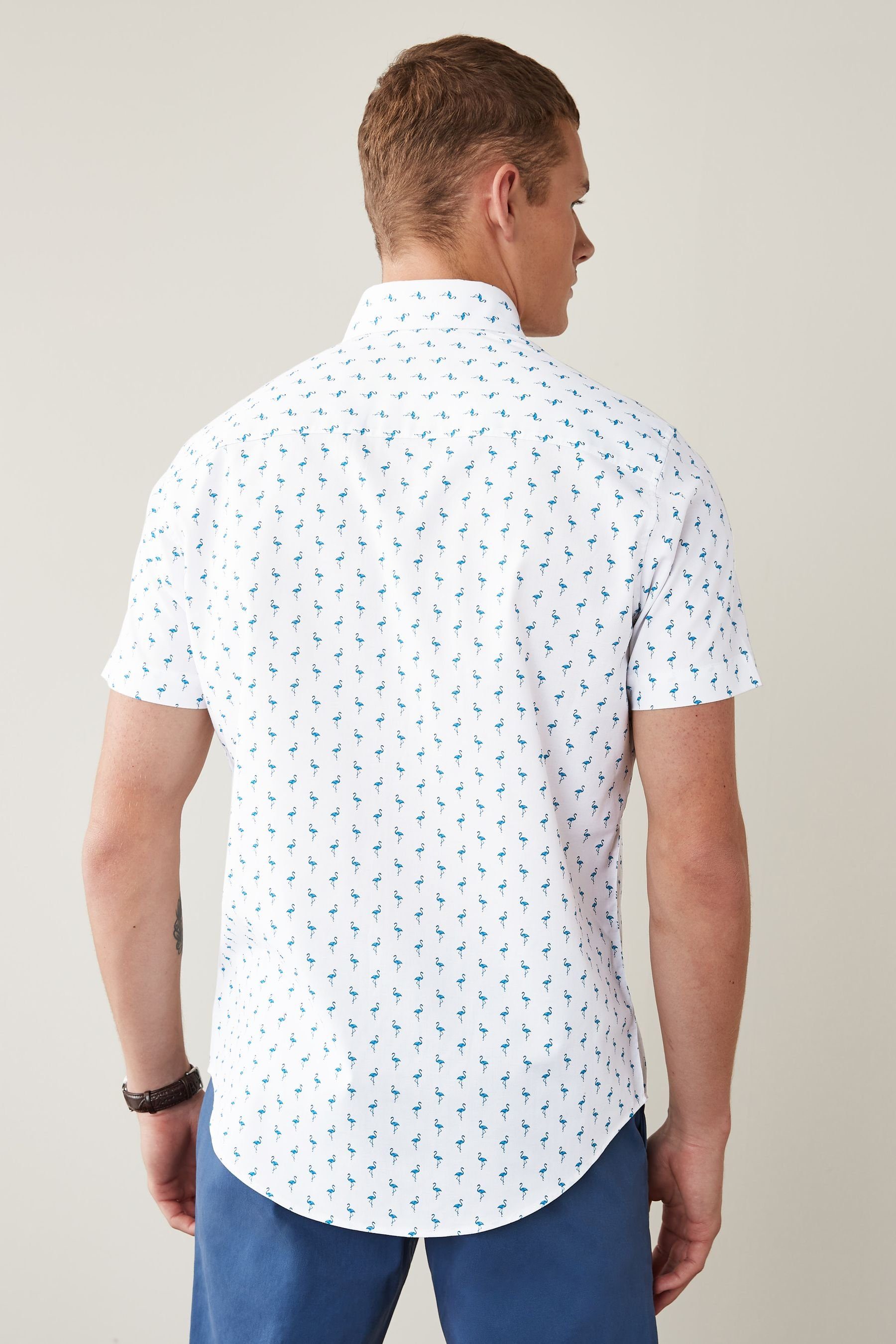 Kurzarm-Oxfordhemd (1-tlg) Regular Fit Blue Kurzarmhemd Next Flamingo Print Bügelleichtes