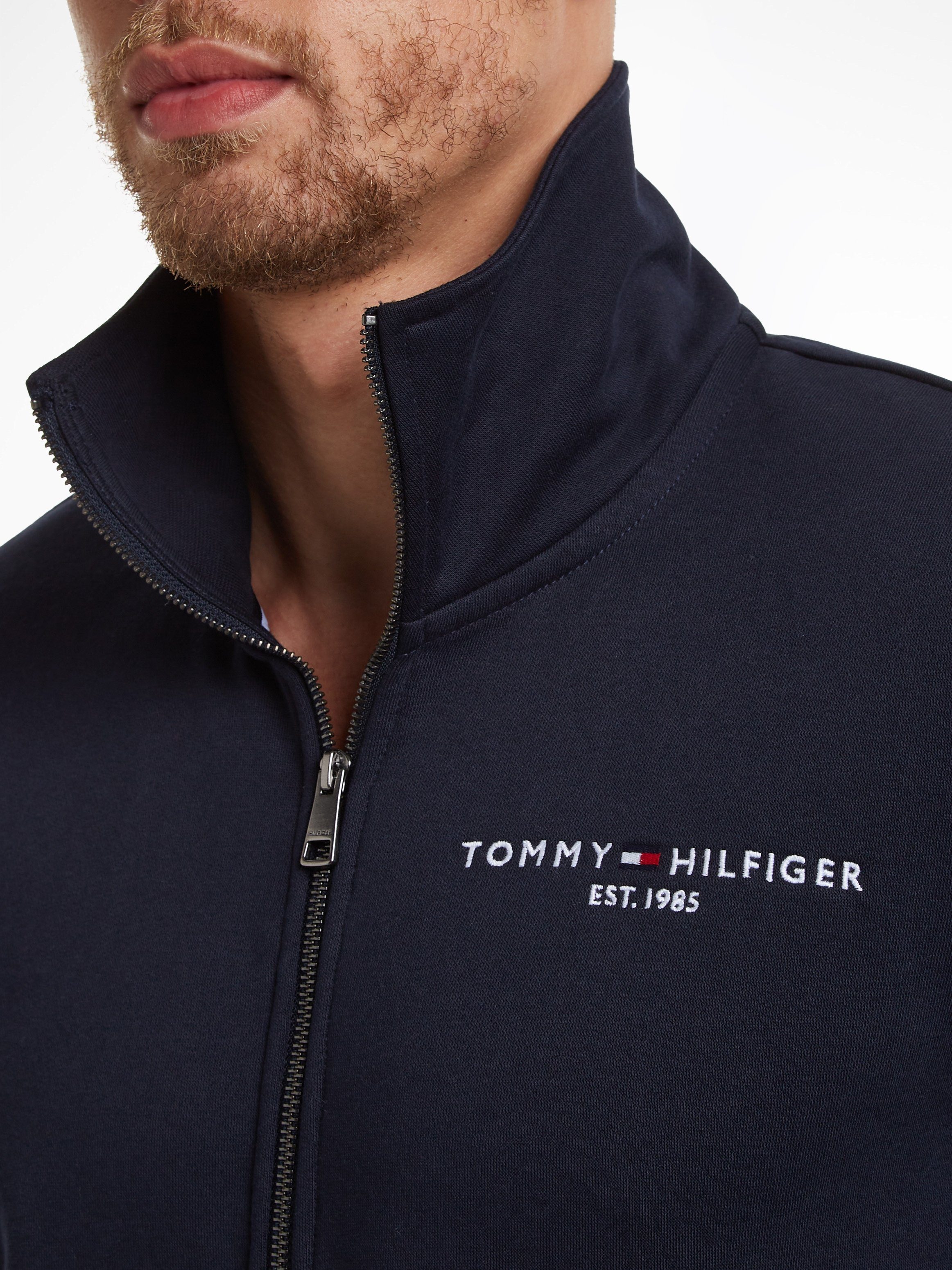 ZIP THRU Sweater Hilfiger LOGO COLLAR TOMMY geteilter mit blau Kängurutasche Reißverschluss und Tommy STAND
