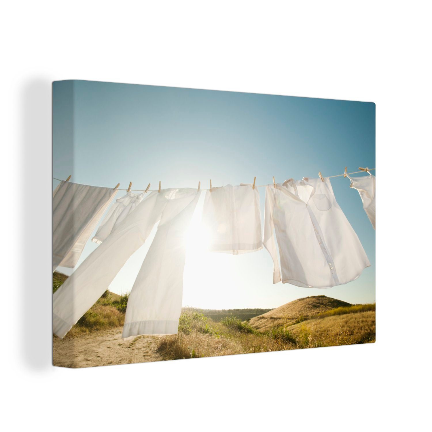 Weiße der (1 Sonne, Leinwandbild 30x20 cm OneMillionCanvasses® Wäsche auf einer Leinwandbilder, Wandbild Aufhängefertig, Wäscheleine in Wanddeko, St),