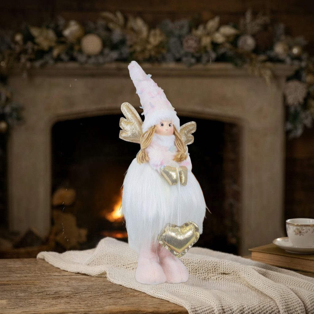 Christmas Paradise Weihnachtsfigur Engel stehend 48cm (Dekofigur, 1 St., Weihnachtsengel), mit goldenen Flügeln, Herzen und einer flauschigen Zipfelmütze.