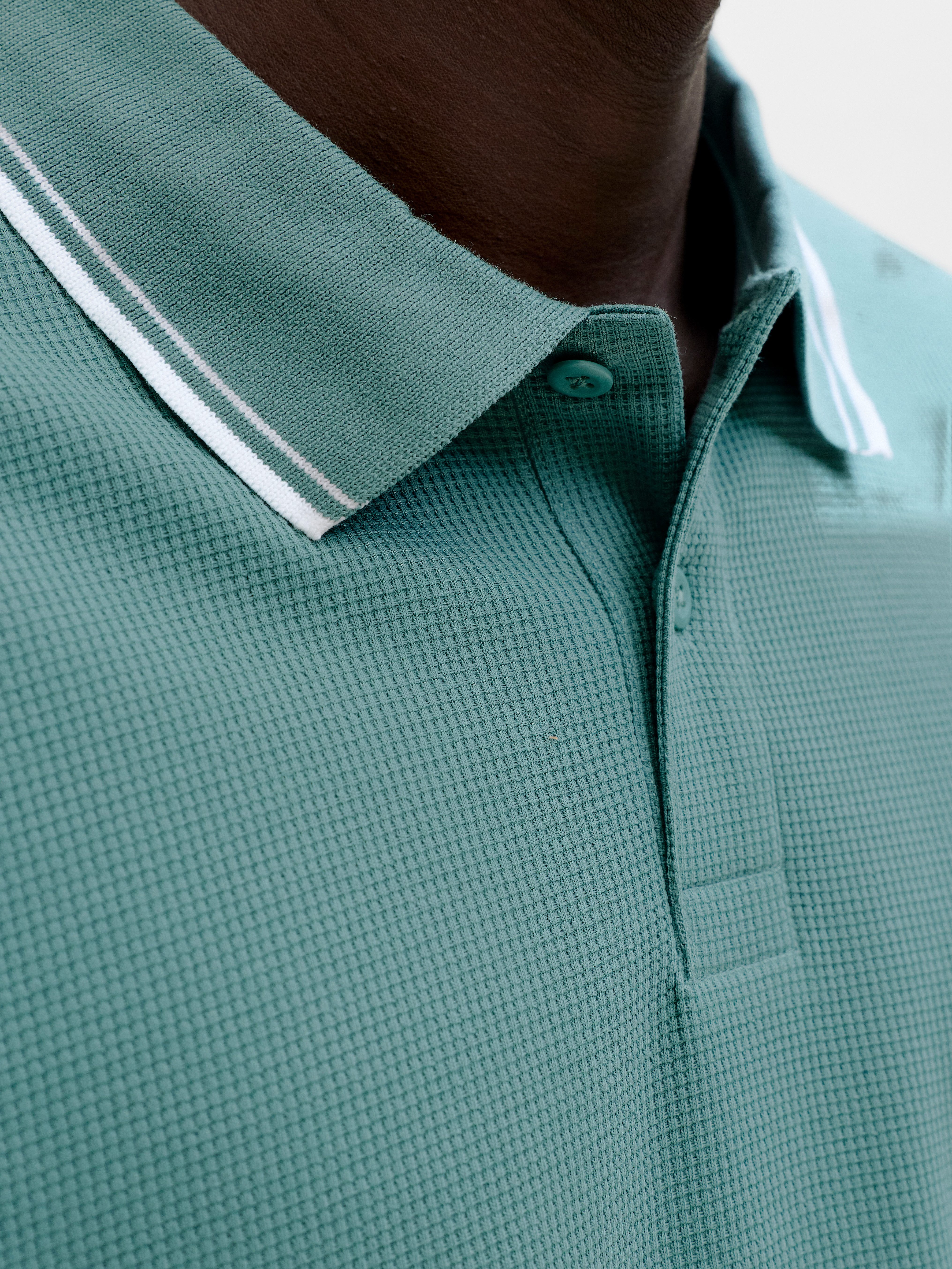 Jack & Jones Poloshirt JJEAUSTIN POLO SS NOOS Materialmix, regular fit