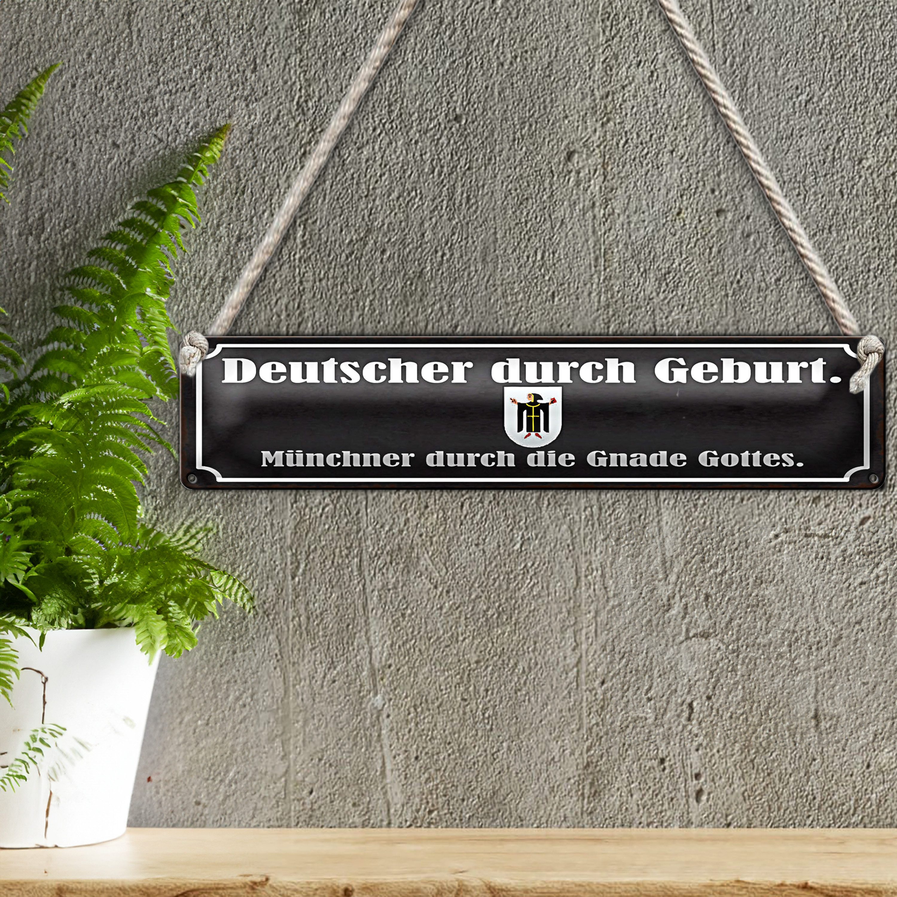 Roomando Metallschild Blechschild Spruch 46x10cm Deutscher durch Geburt Münchner Dekoration