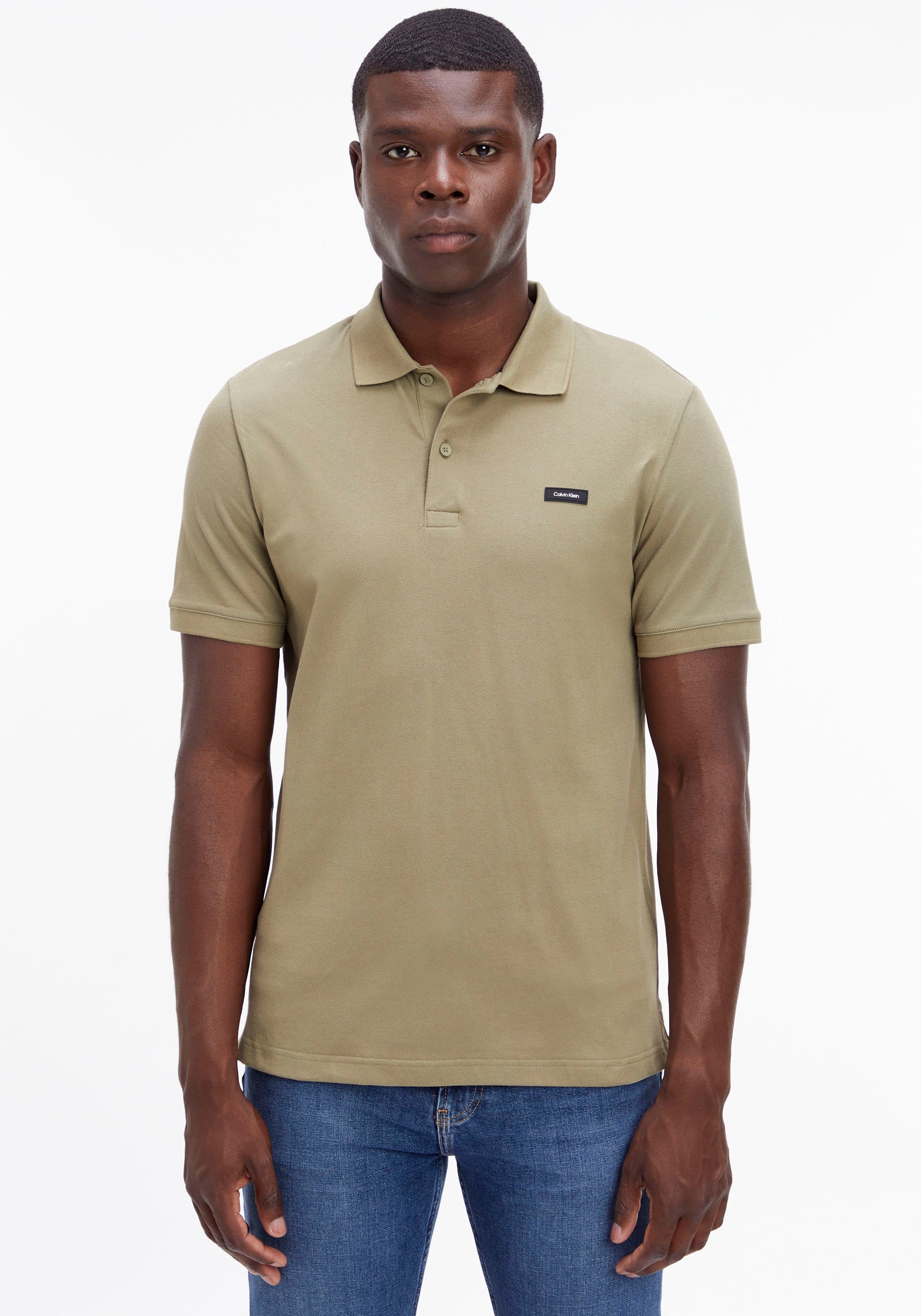 Calvin Klein Poloshirt mit Calvin der auf Klein Logo green Brust delta
