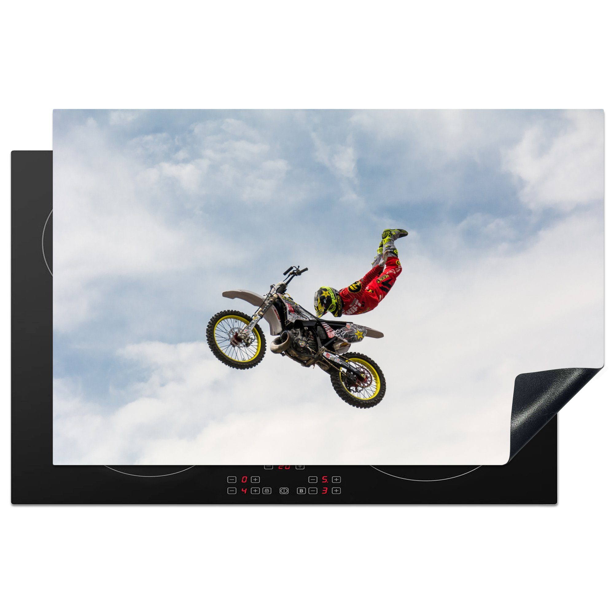MuchoWow Herdblende-/Abdeckplatte Motorrad und Motorradfahrer bei einem Stunt in der Luft, Vinyl, (1 tlg), 81x52 cm, Induktionskochfeld Schutz für die küche, Ceranfeldabdeckung