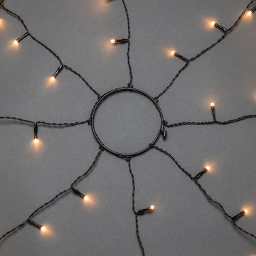 KONSTSMIDE LED-Baummantel Weihnachtsdeko aussen, Christbaumschmuck, 8h Timer, vormontiert, Ring Ø 17, 8 Stränge à 70 bernsteinfarbene Dioden, mit Glimmereffekt
