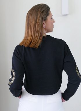 KR-Industries Sweatshirt Cropped Sweat Lirio del Sol (mit Sweatshirt) mit goldenen Applikationen auf der Vorderseite und den beiden Ärmeln, mit Rundhalsausschnitt, in Unifarben mit Applikationen in weiß und gold