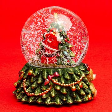SIKORA Schneekugel SK11 Weihnachtsmann auf dem Baum bunte LED Beleuchtung D:6,5cm