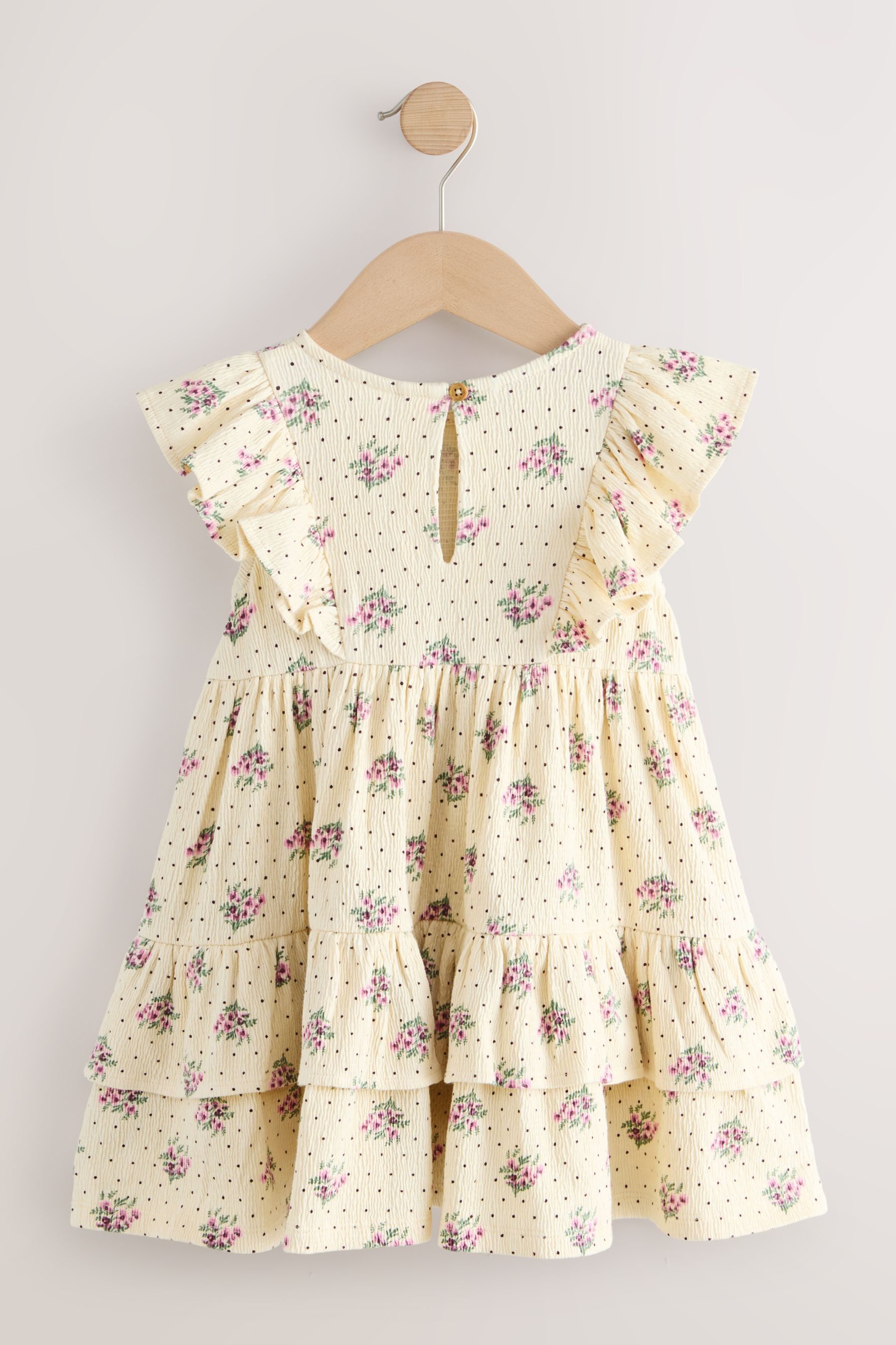Next Sommerkleid Ärmelloses Sommerkleid mit Rüschen und Schleife (1-tlg)