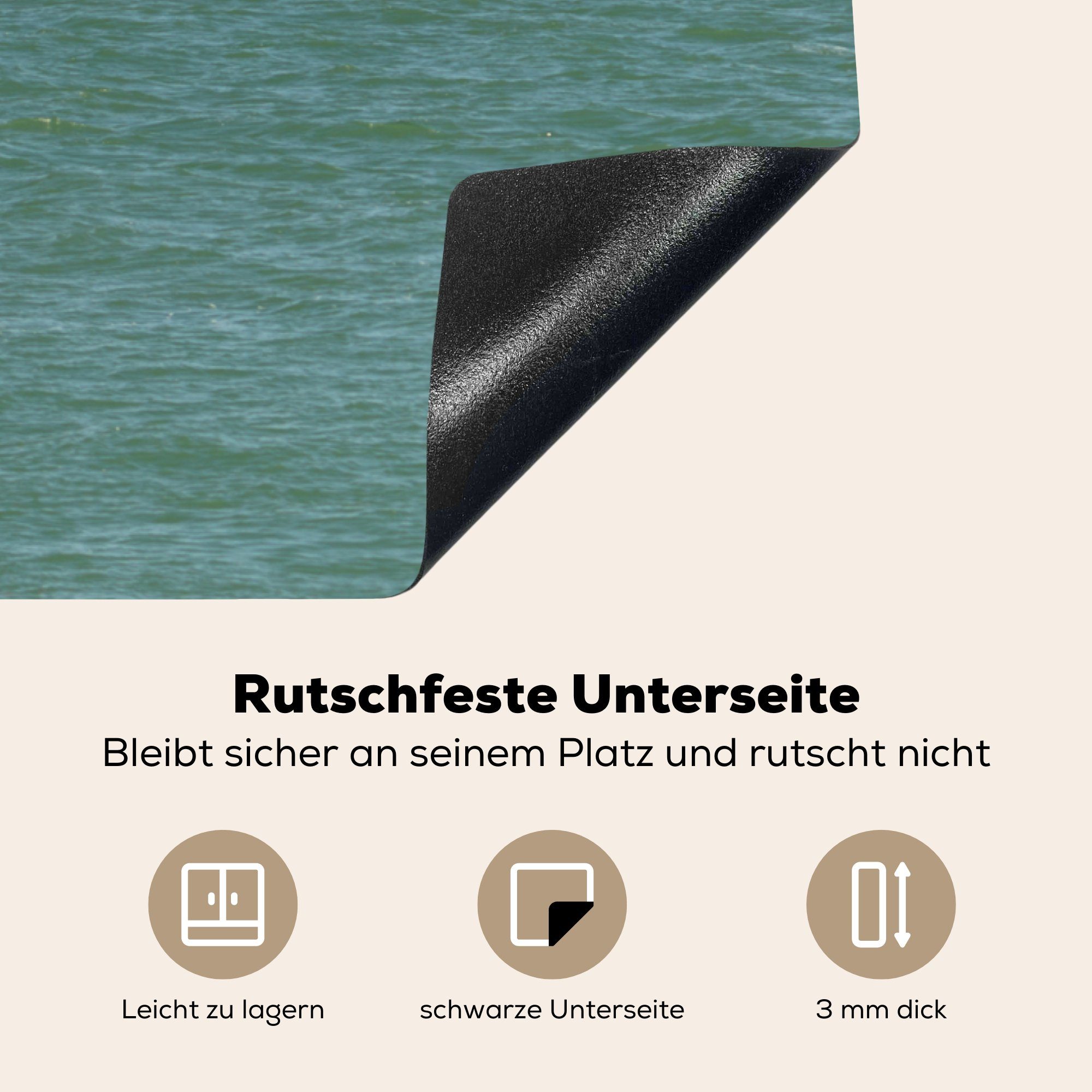 Vinyl, auf Meer, Rettungsboot 85x52 Herdblende-/Abdeckplatte Ceranfeldabdeckung für Induktionsmatte in Fahrt küche, MuchoWow die orangefarbenes dem (1 tlg), voller Ein cm,