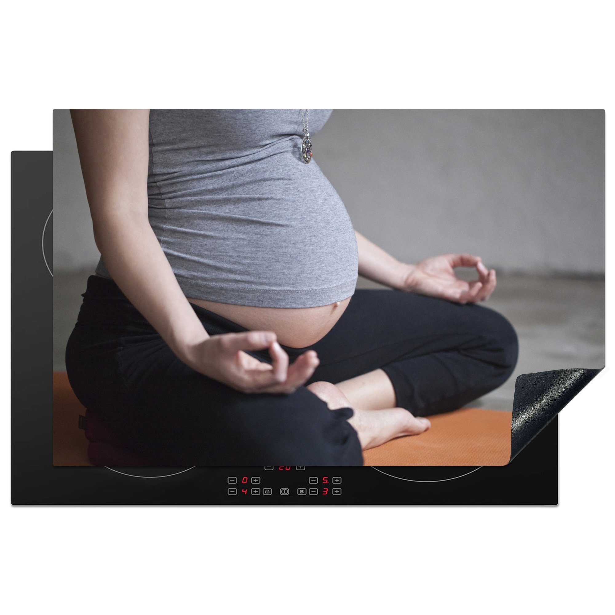 MuchoWow Herdblende-/Abdeckplatte Eine schwangere Frau beim Yoga, Vinyl, (1 tlg), 81x52 cm, Induktionskochfeld Schutz für die küche, Ceranfeldabdeckung
