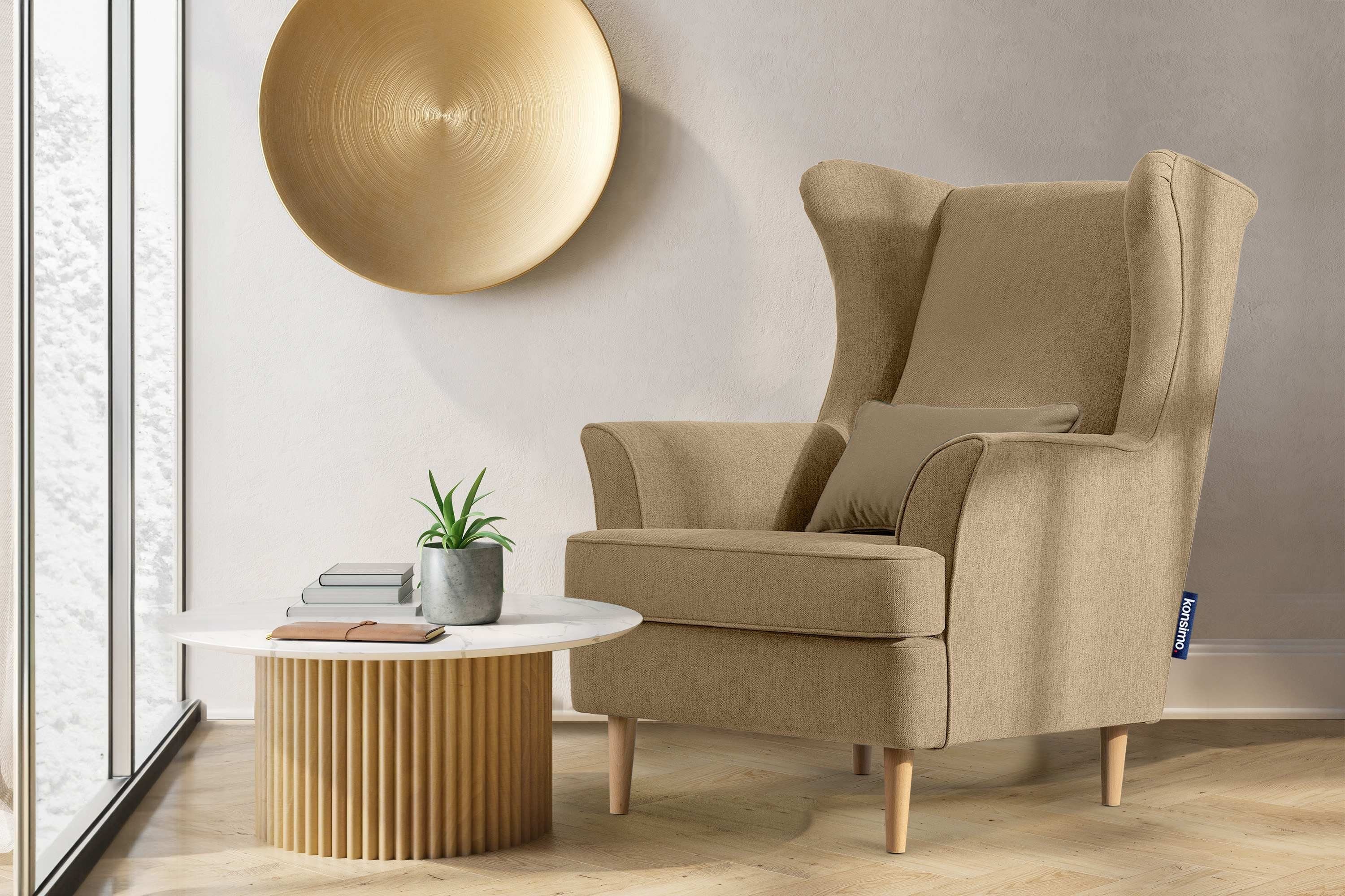 Konsimo Ohrensessel STRALIS Sessel, Füße, Kissen Design, inklusive dekorativem hohe zeitloses