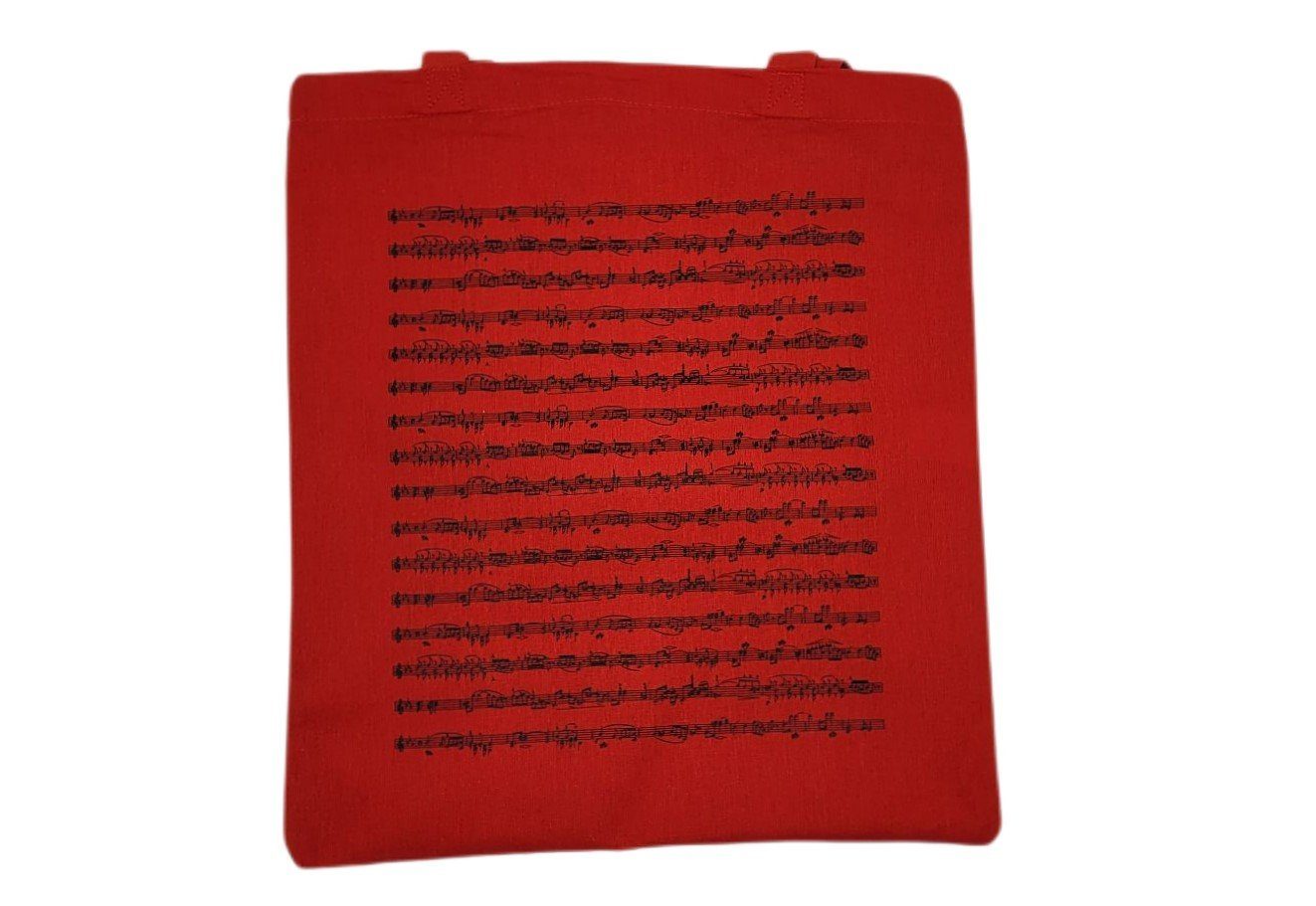Henkeltasche rot mit Tragetasche, aufgedruckten beidseitig Notenlinien Musikboutique in