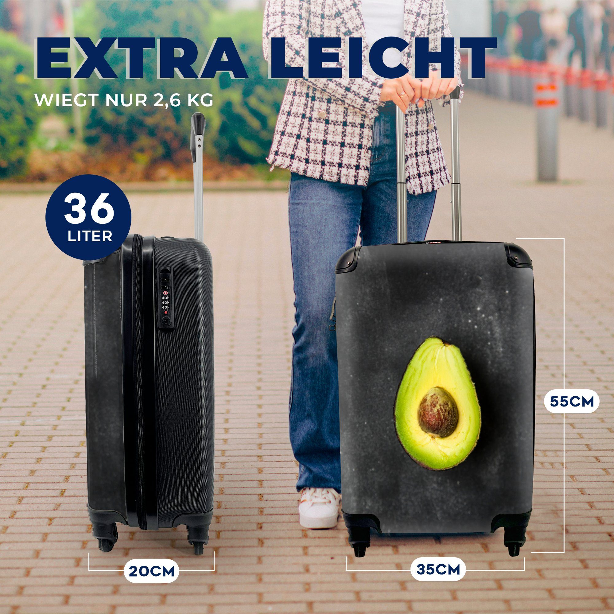 für Ferien, Reisetasche auf Reisekoffer einem 4 Einsame Handgepäck MuchoWow Avocado mit Rollen, Tisch, Handgepäckkoffer schwarzen Trolley, rollen,