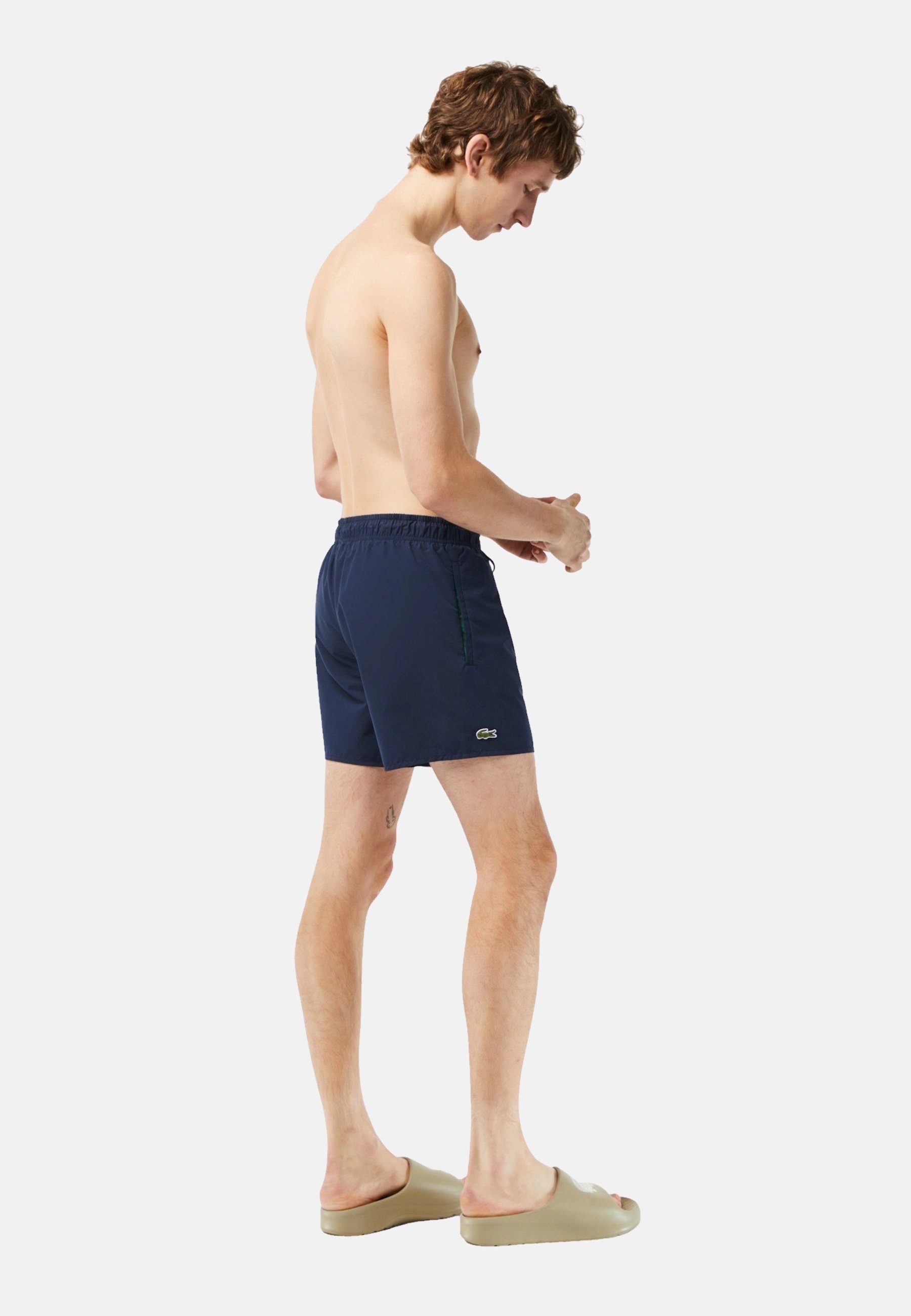 Lacoste Badeshorts Badehose Bade-Shorts mit Taschen, Mesh-Futter und (1-St)