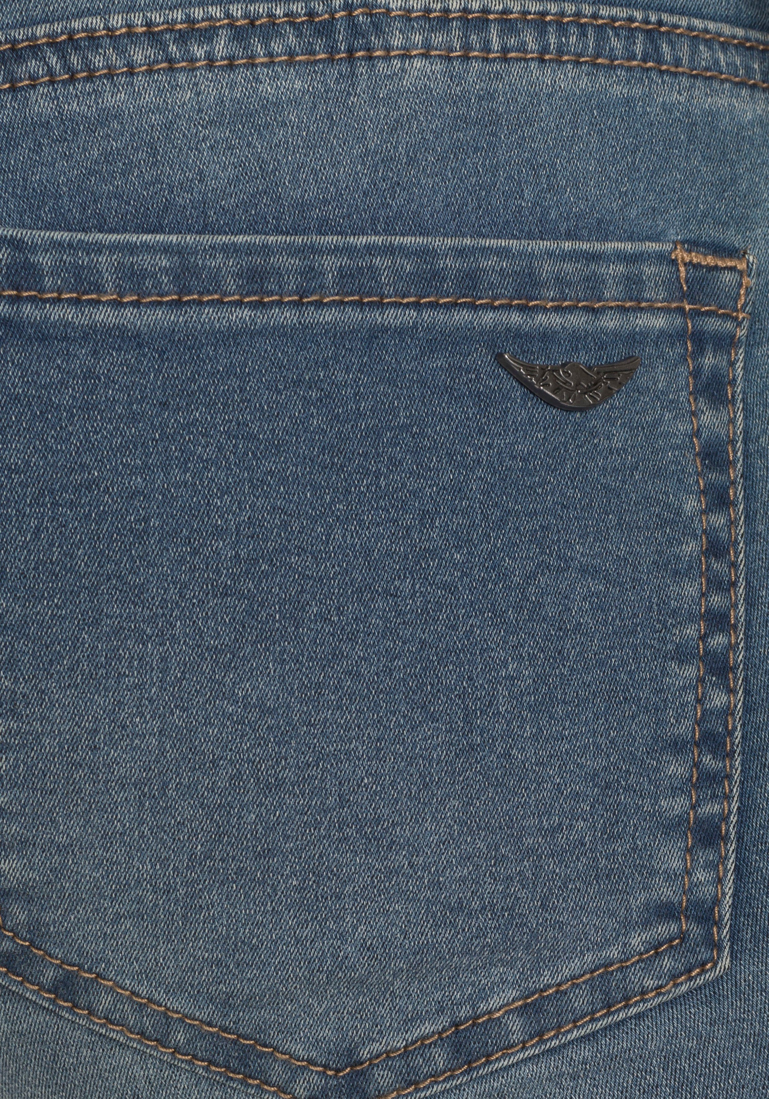 Stretch-Einsätzen Bund blue-used Low Stretch Skinny-fit-Jeans Ultra mit Arizona seitlichen am Waist