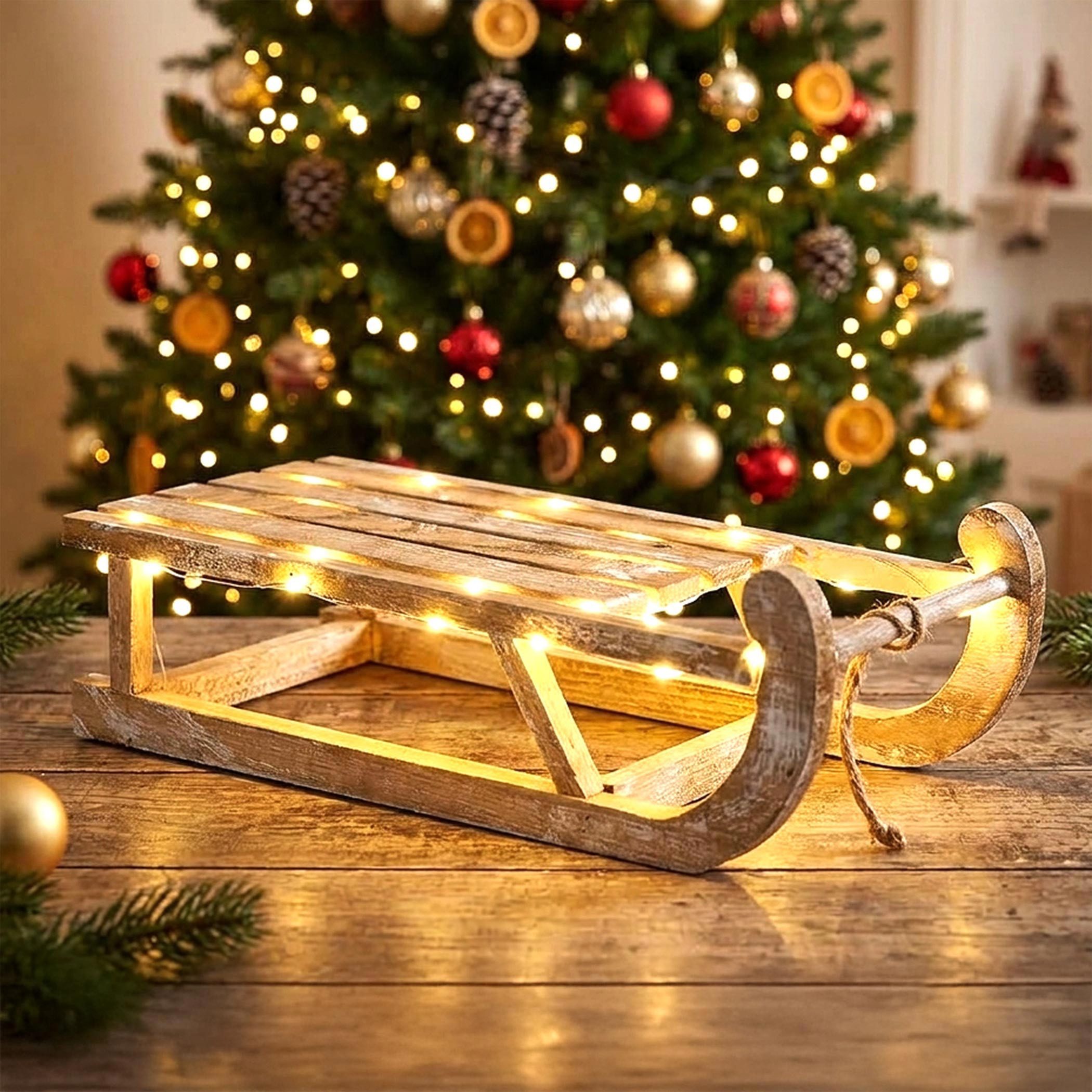 Spetebo LED Dekoobjekt LED Holz Deko Schlitten natur - 50 x 23 cm, Timerfunktion, LED fest integriert, warm weiß, batteriebetrieben