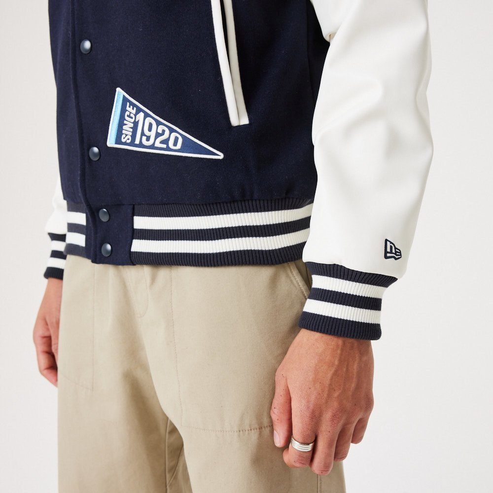 New Era Collegejacke Varsity Heritage Over All College Patch