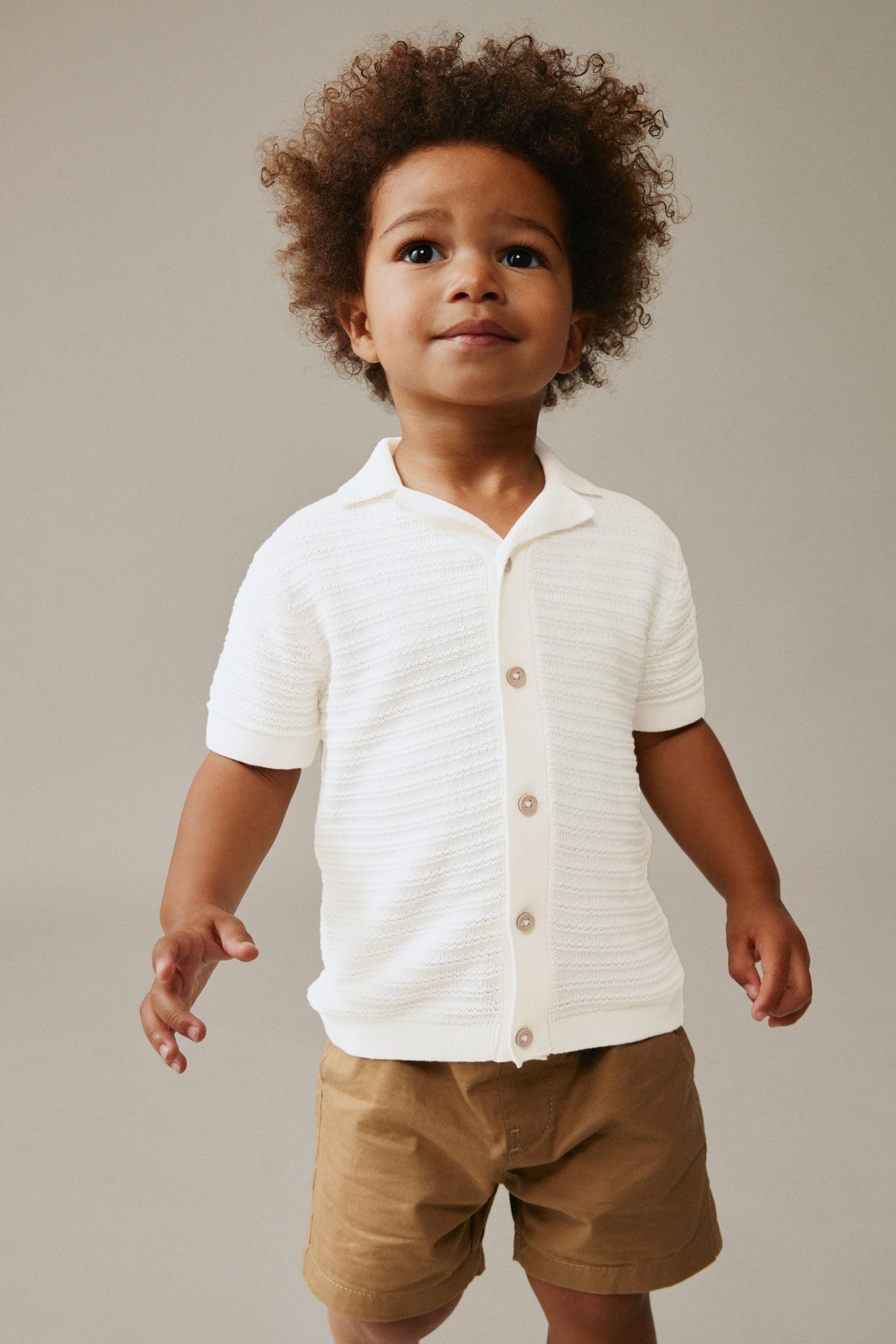 Polokragenpullover Strick-Polo-Shirt mit Reverskragen und Motiv