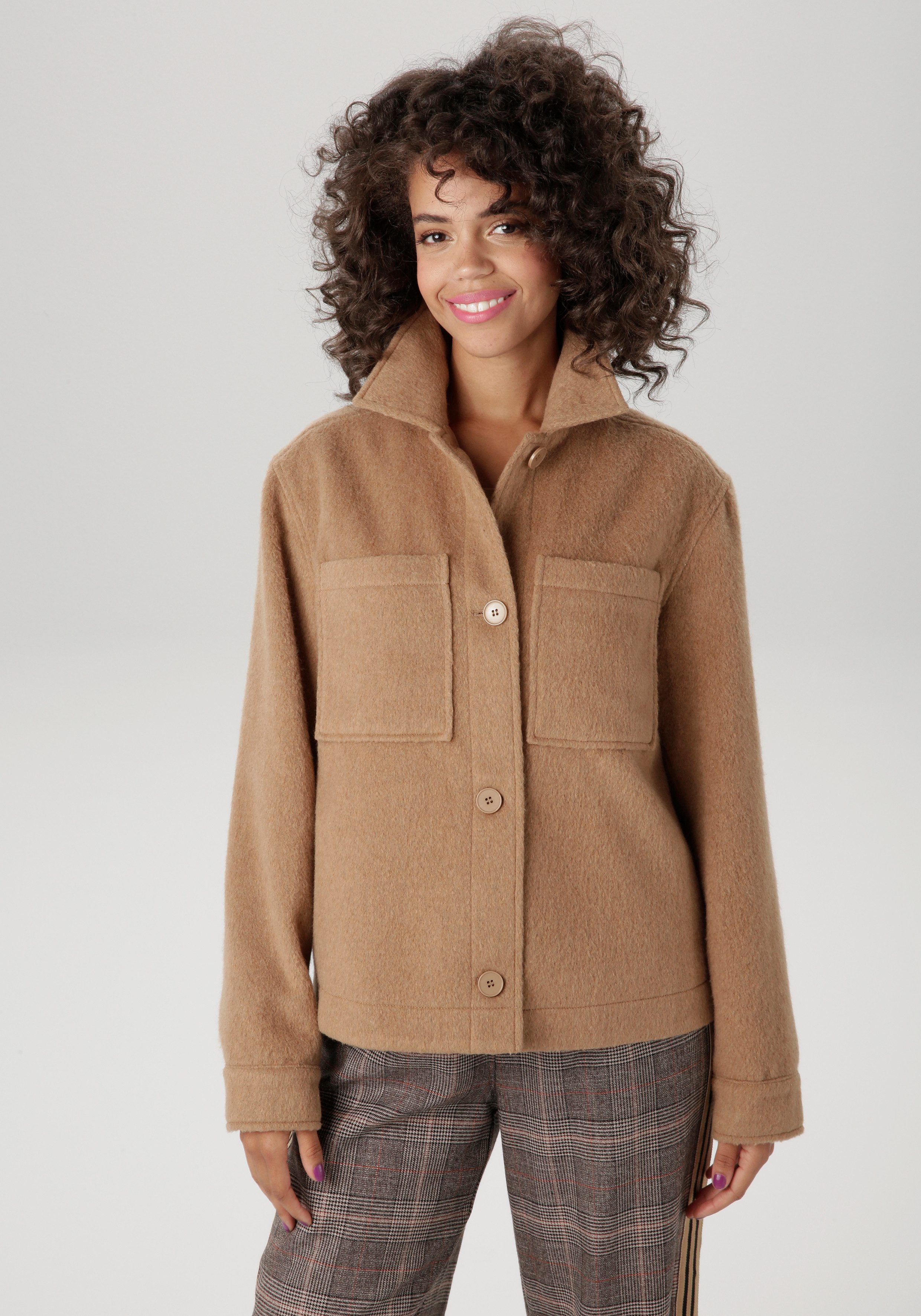 Aniston CASUAL Fleecejacke mit tonigen Knöpfen zu schließen. € 69,99