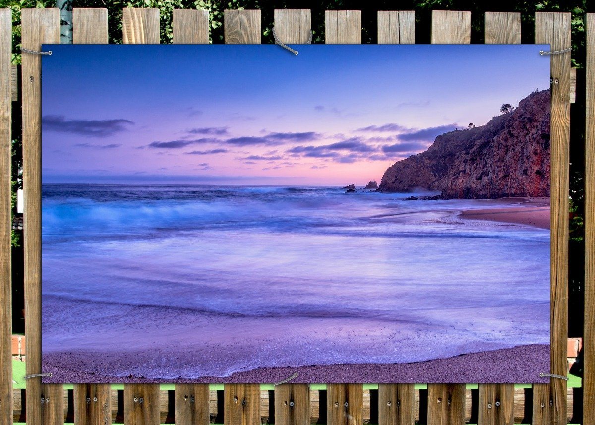Thumbnail - Wallario Sichtschutzzaunmatten Kalifornischer Strand am Abend mit Felsenküste