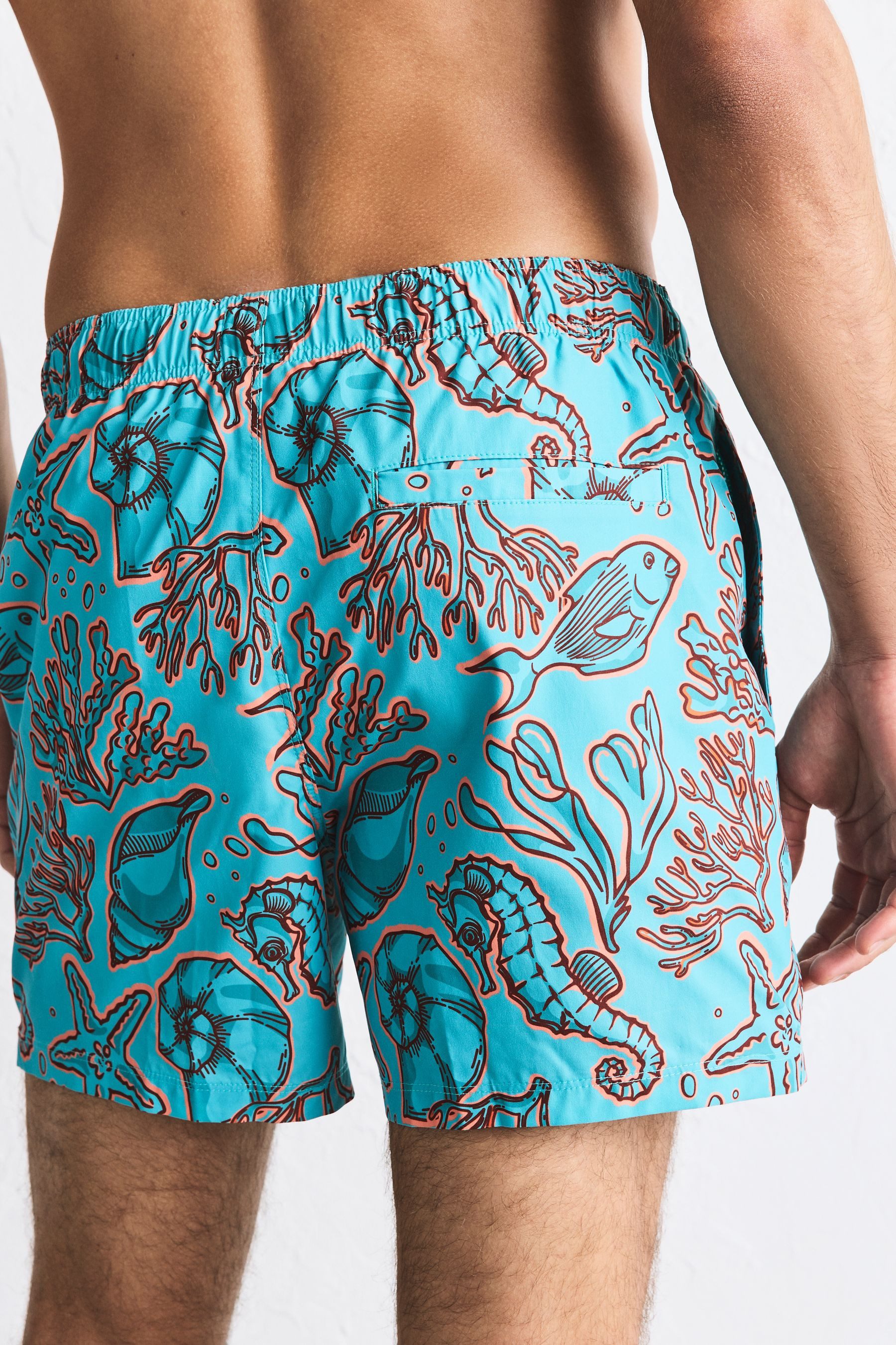 Next Badeshorts Badeshorts mit Korallen- und Muschel-Print (1-St)