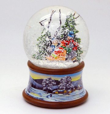 MINIUM-Collection Schneekugel Familie Schlitten Winterwald auf Winterlandschaft Sockel Spieluhr 10cm