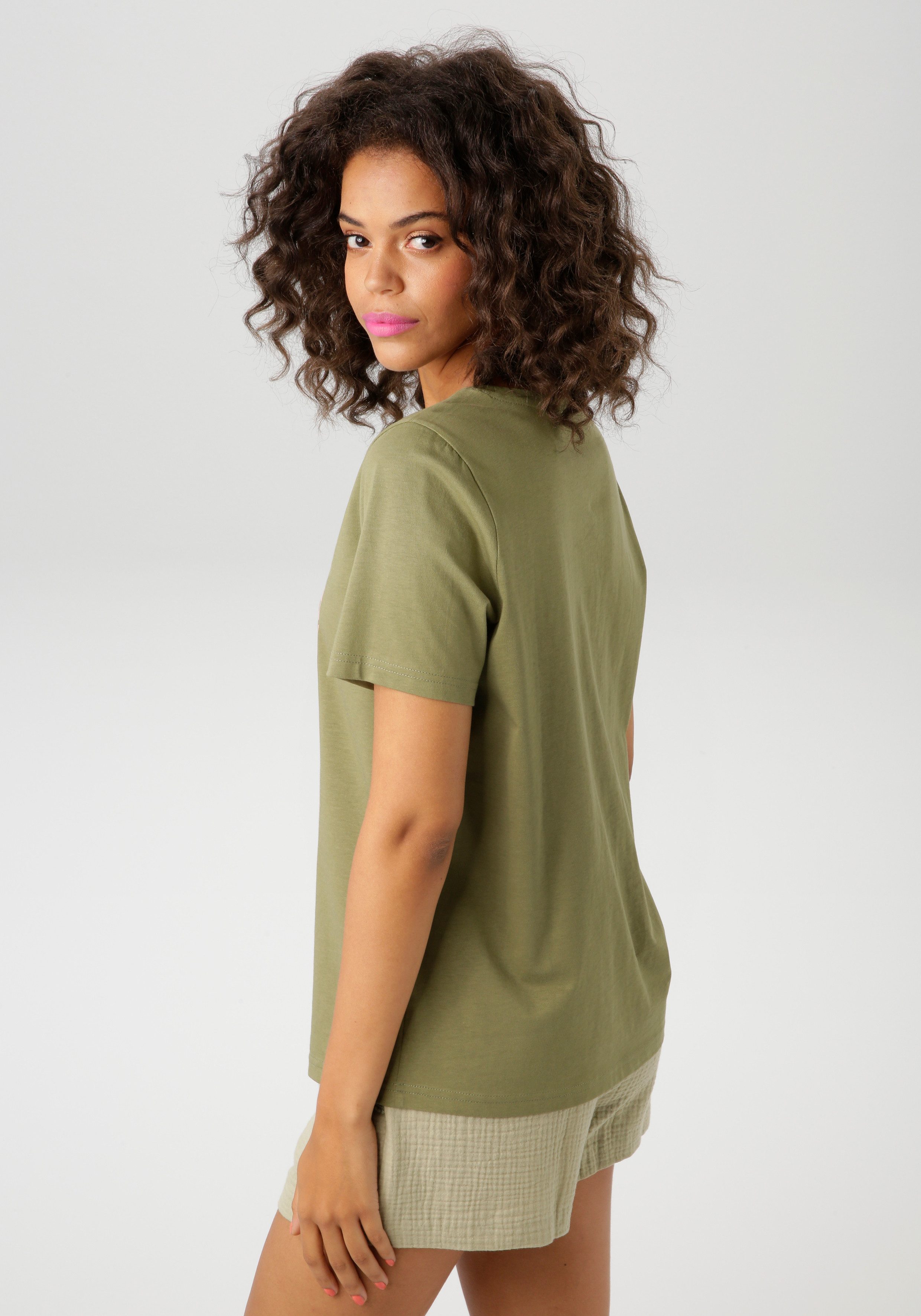 Aniston CASUAL T-Shirt, mit farbharmonischen Frontprint aus Foliendruck günstig online kaufen