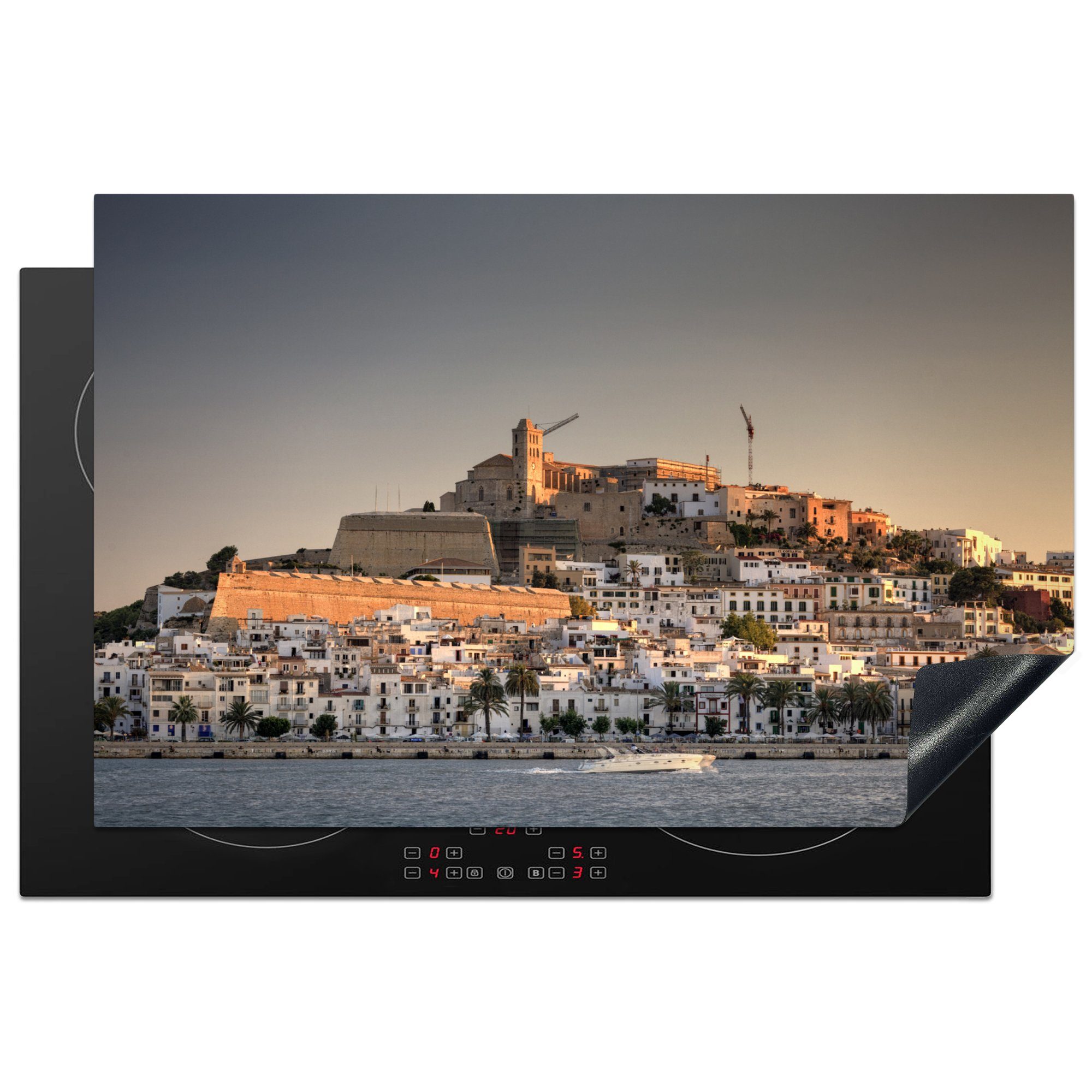 MuchoWow Herdblende-/Abdeckplatte Blick auf die Küstenlinie von Ibiza-Stadt, Vinyl, (1 tlg), 81x52 cm, Induktionskochfeld Schutz für die küche, Ceranfeldabdeckung