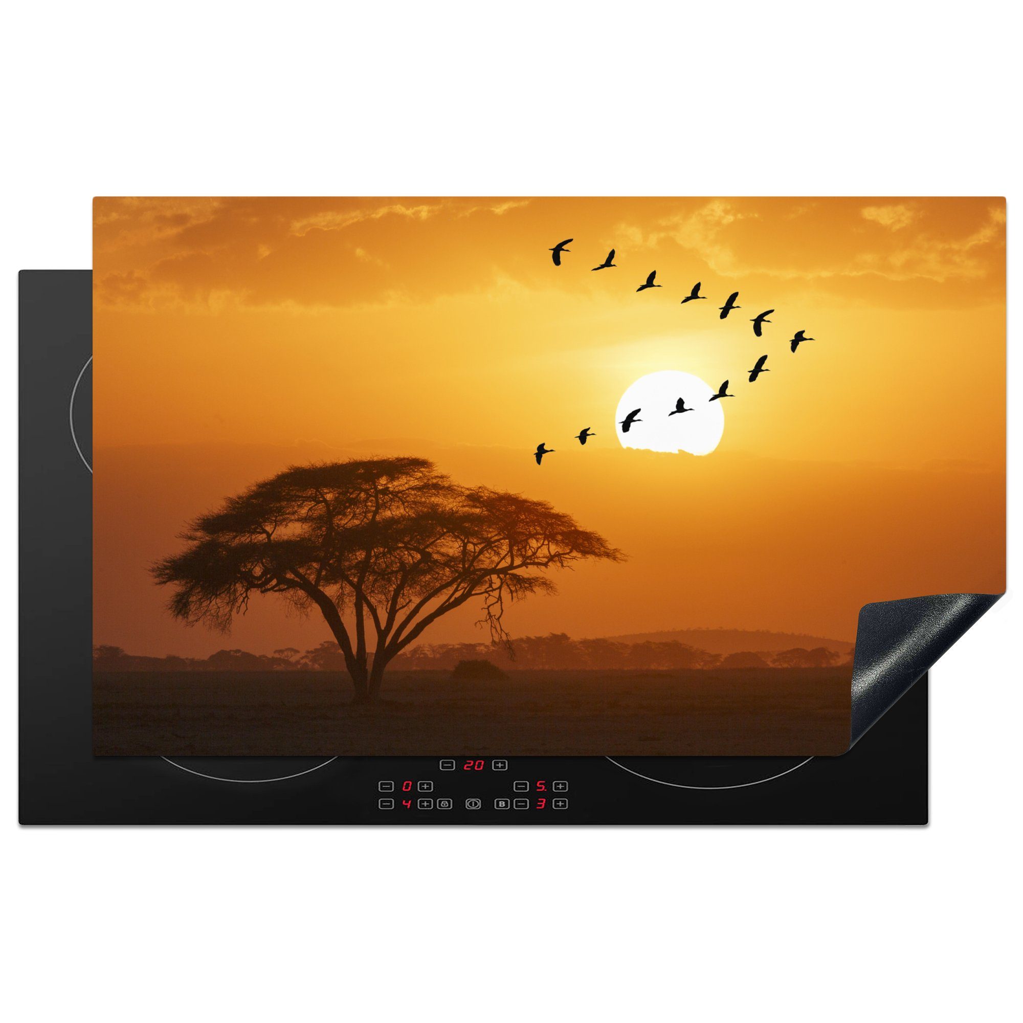 MuchoWow Herdblende-/Abdeckplatte Ein Schwarm Nilgänse fliegt in V-Formation bei Sonnenuntergang in, Vinyl, (1 tlg), 83x51 cm, Ceranfeldabdeckung, Arbeitsplatte für küche