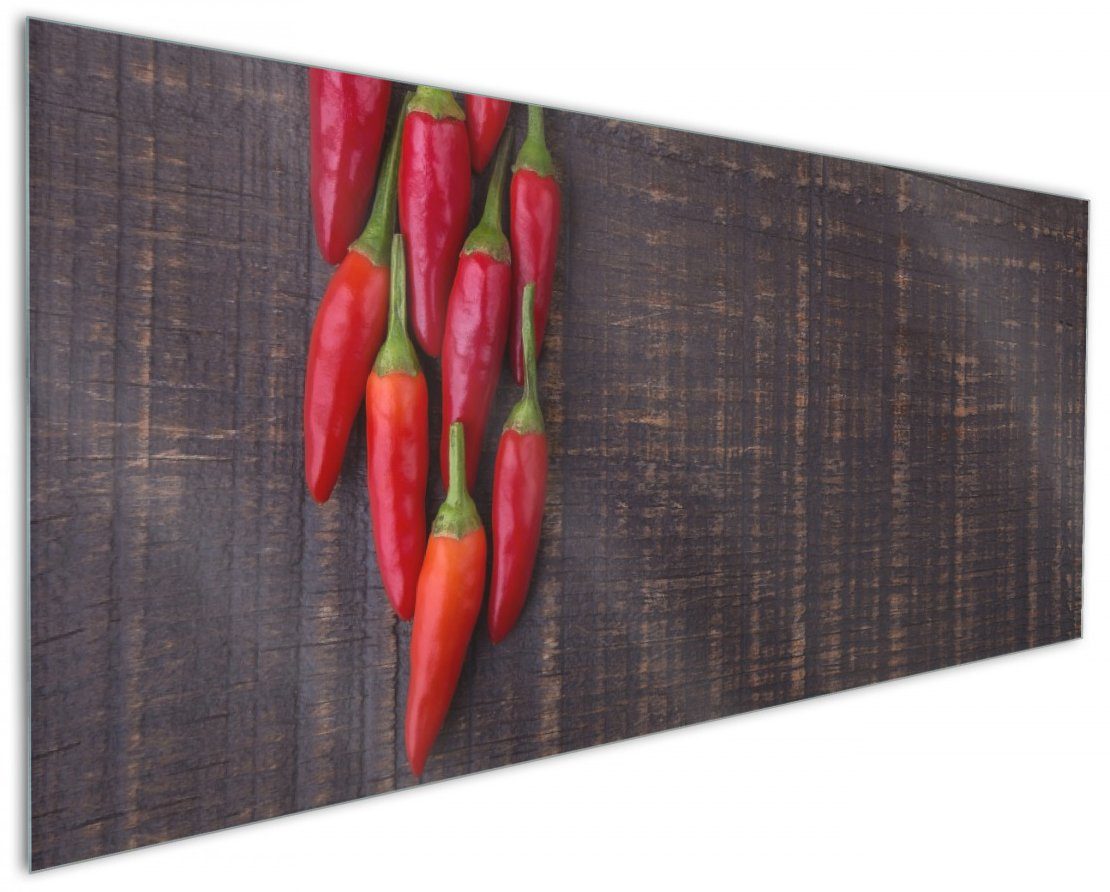 Wallario Küchenrückwand Rote Paprikaschoten auf einem dunkelbraunem Holzbrett, (1-tlg)