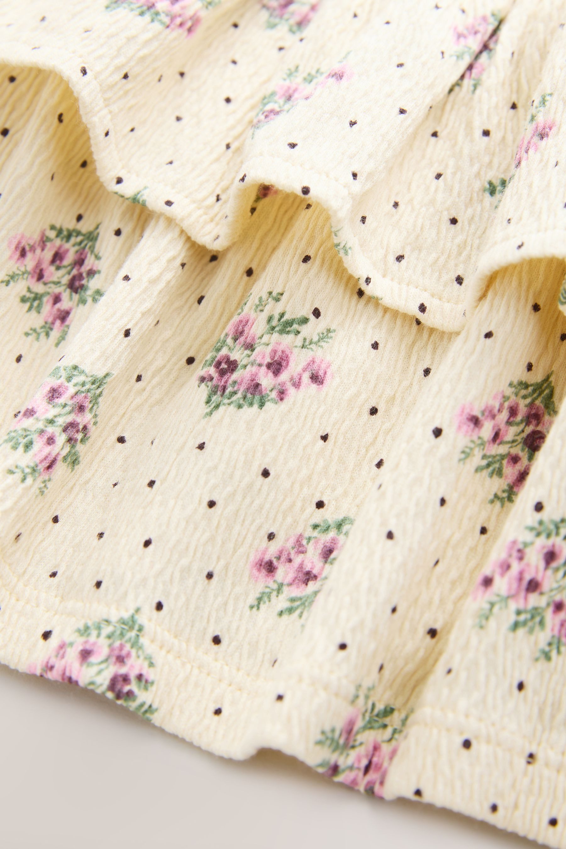Next Sommerkleid Ärmelloses Sommerkleid mit Rüschen und Schleife (1-tlg)