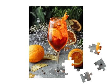 puzzleYOU Puzzle Aperol Spritz: Cocktail auf grauem Hintergrund, 48 Puzzleteile, puzzleYOU-Kollektionen Cocktails
