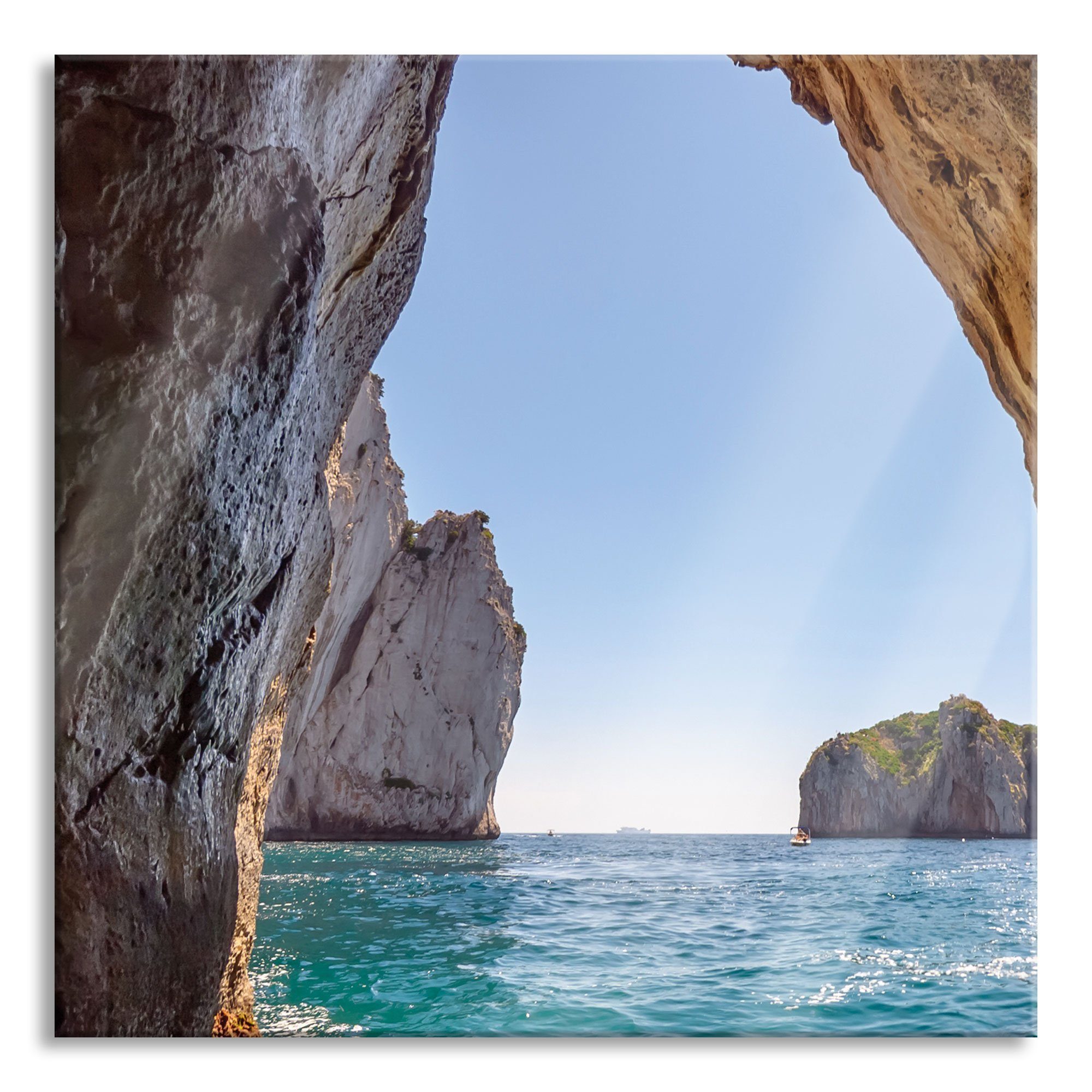 Glasbild Felstor im Meer