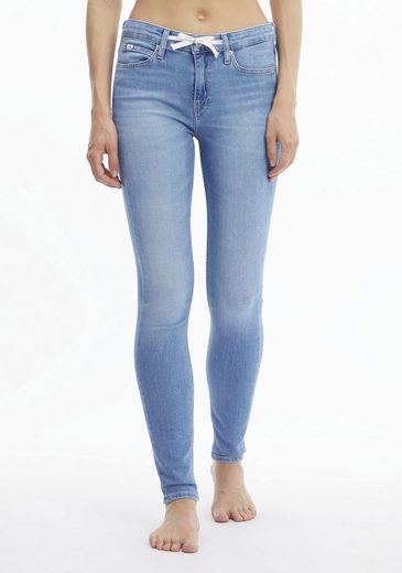 Calvin Klein Jeans Skinny-fit-Jeans »MID RISE SKINNY« mit Bindeband mit Calvin Klein Jeans Logo-Badge
