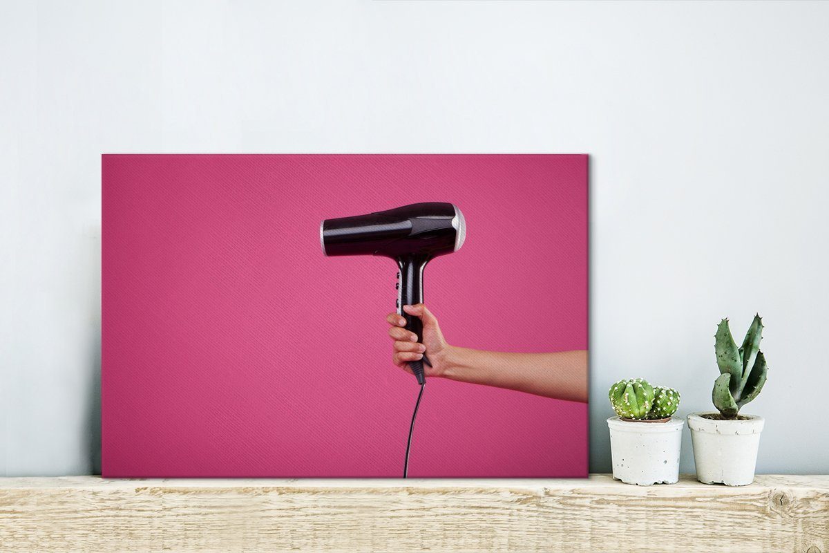 Ein auf Leinwandbild (1 St), cm rosa Aufhängefertig, 30x20 Wandbild Hintergrund, Haartrockner OneMillionCanvasses® Wanddeko, Leinwandbilder, einem schwarzer