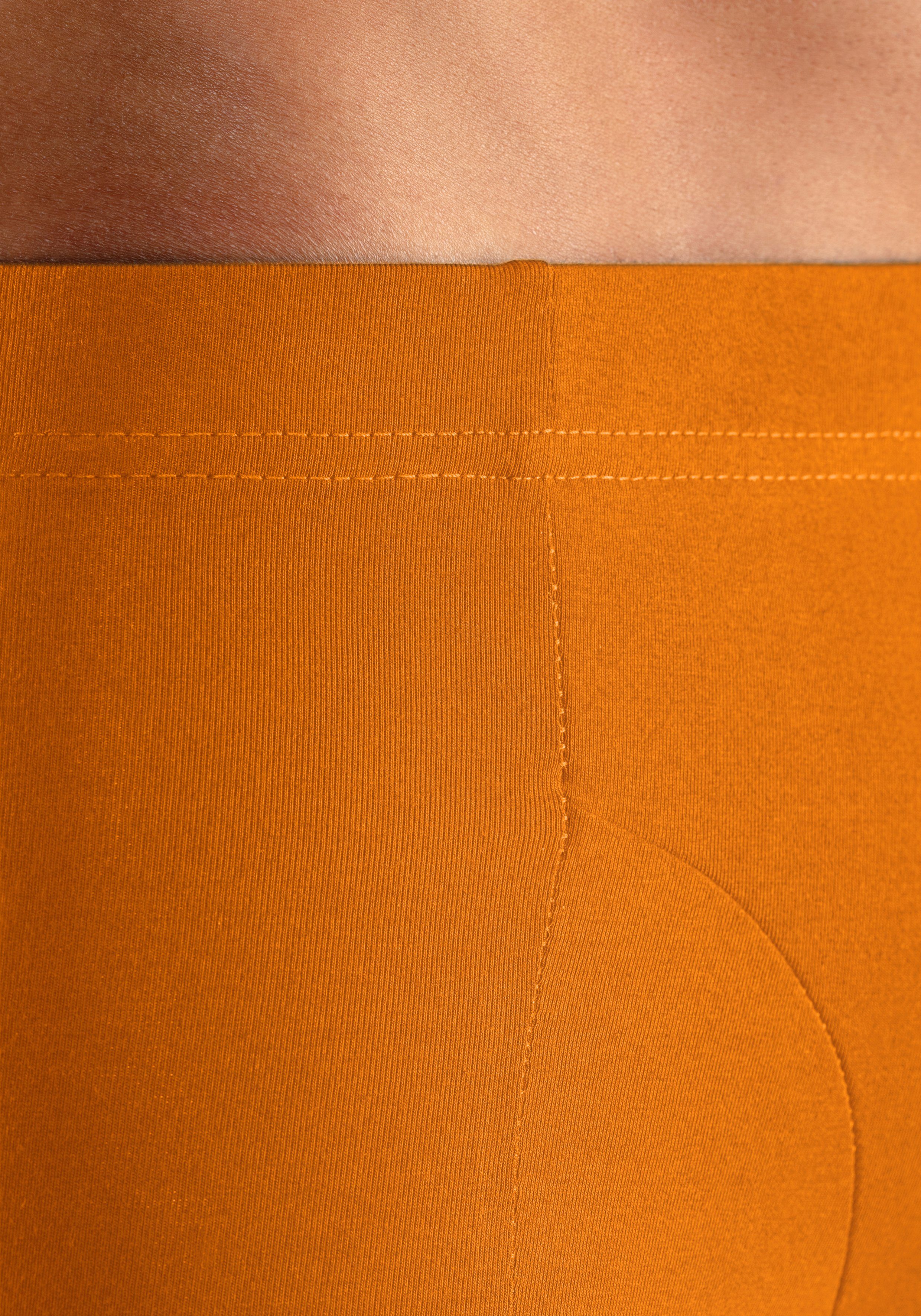 dem 4-St) der Bench. mit Bein Dose schwarz, auf Boxer lila (Packung, kleinem in orange, Logodruck türkis,