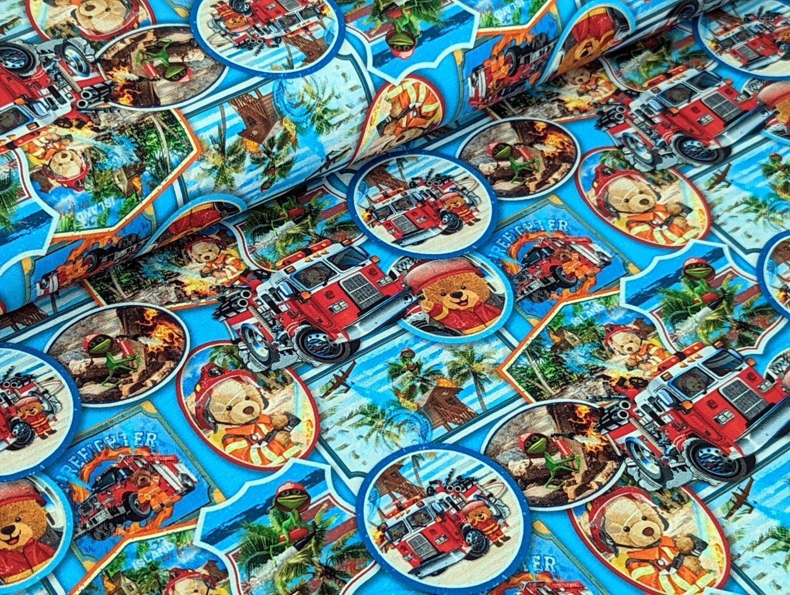 Corileo Stoff Baumwolljersey Teddybär als Feuerwehrbär auf Blau Stoff